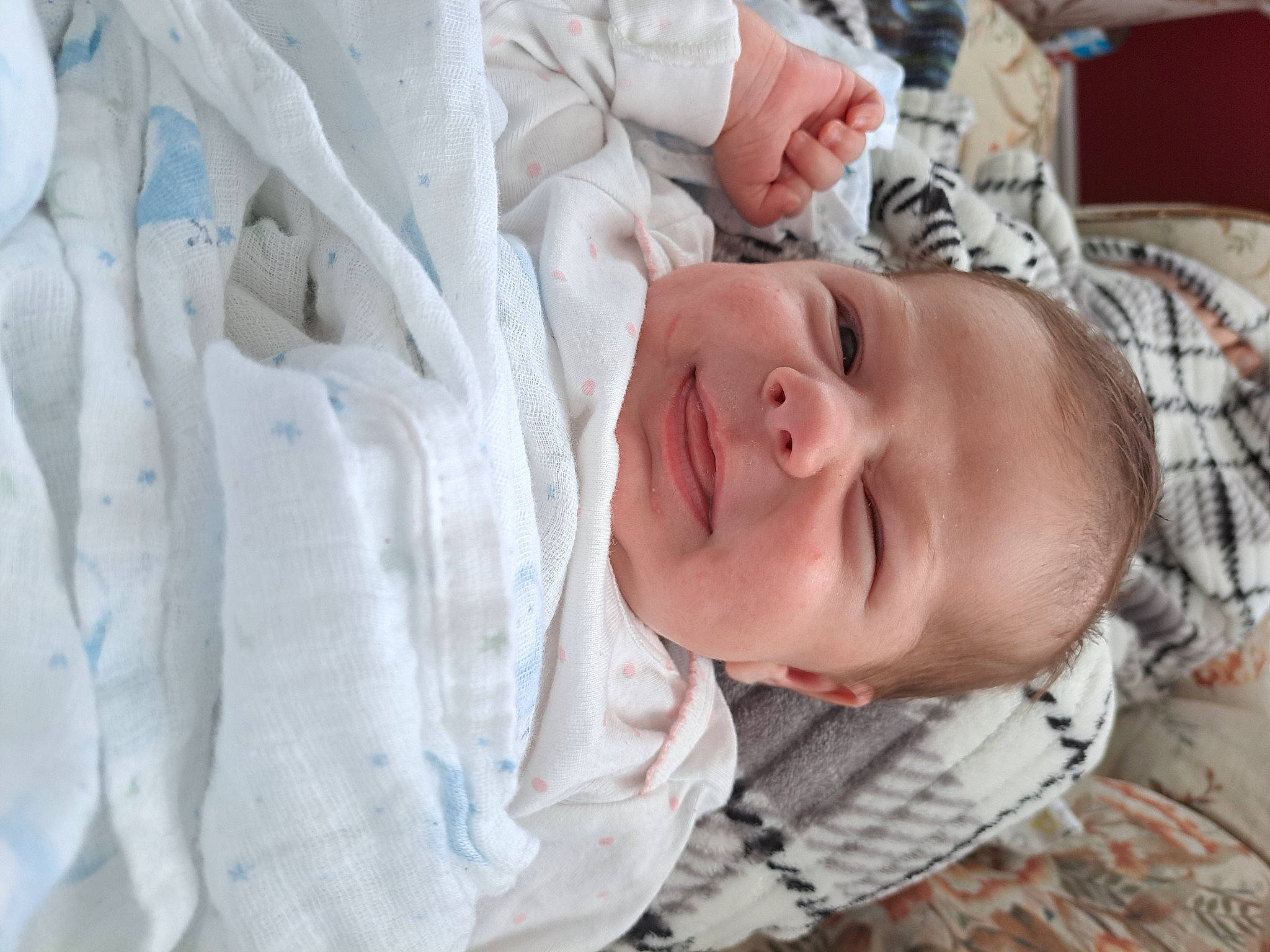 Noella is registered to the contest to win money with this photo: baby, baby_products, baby_safety, baby_toddler_clothing, cheek, child, comfort, eye, face, facial_expression, happy, head, linens, mouth, nose, person, room, skin, sleeve, smile