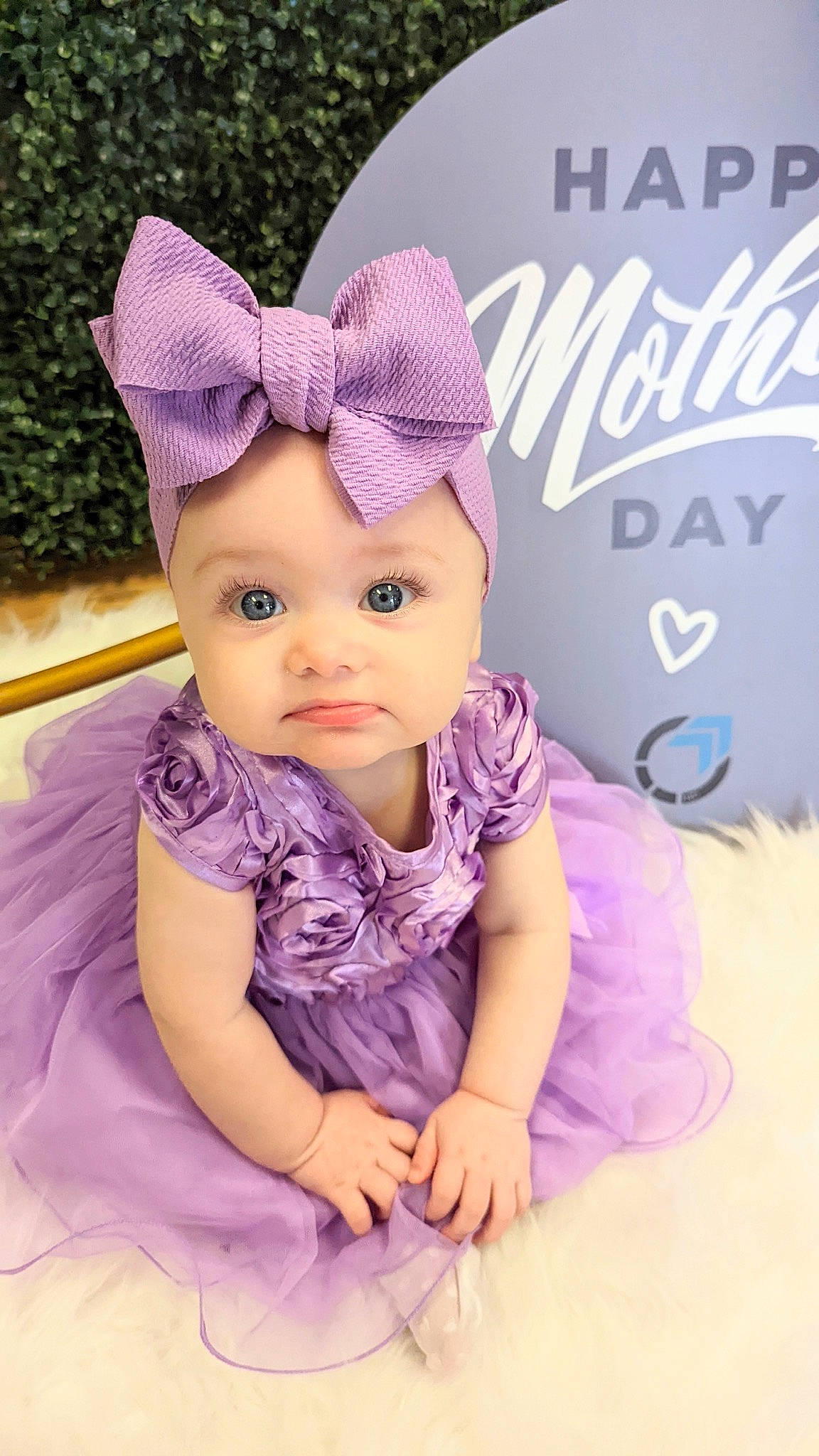 Brinley joined the competition — help win amazing prizes! baby, baby_toddler_clothing, cap, child, clothing, costume_hat, face, font, hair_accessory, happy, headwear, knit_cap, magenta, outerwear, pattern, person, pink, purple, skin, sleeve