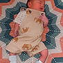 Robbie is registered to the contest to win money with this photo: baby, blanket, clothing, cushion, dress, face, footwear, furniture, head, homedecor, hosiery, newborn, pants, person, photography, portrait, quilt, shoe, sleeping, sock