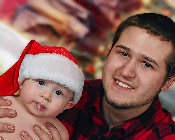 Jaxson is registered to the contest to win money with this photo: baby, child, christmas, christmas_eve, family, fictional_character, happy, headwear, holiday, joy, love, people, person, photography, red, santa_claus, smile, toddler