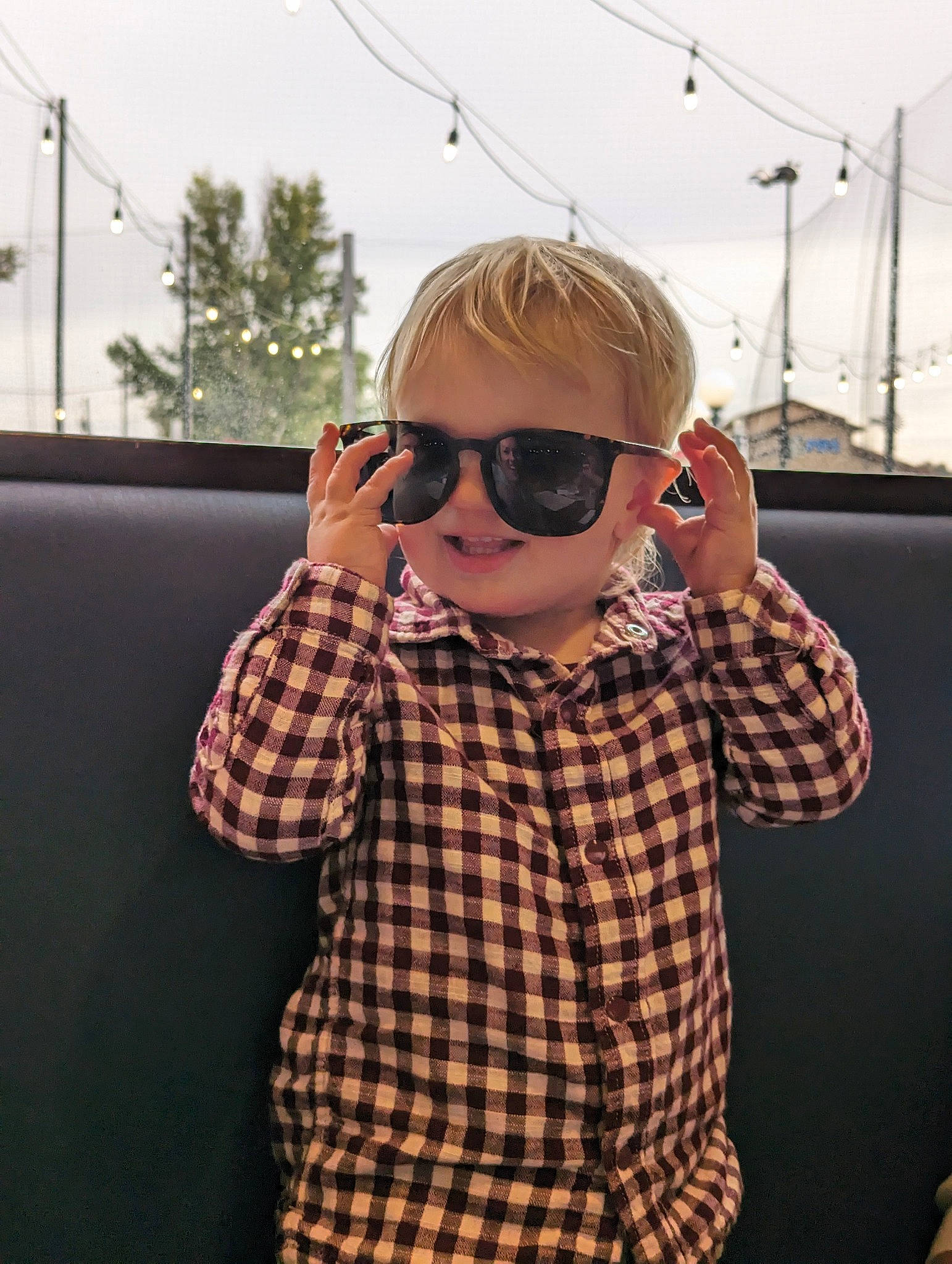 Axton joined the competition — help win amazing prizes! electronic_device, eyewear, fun, gesture, glasses, goggles, hair, hand, happy, joint, pattern, person, plaid, shoulder, sky, sleeve, sunglasses, tartan, thumb, toddler
