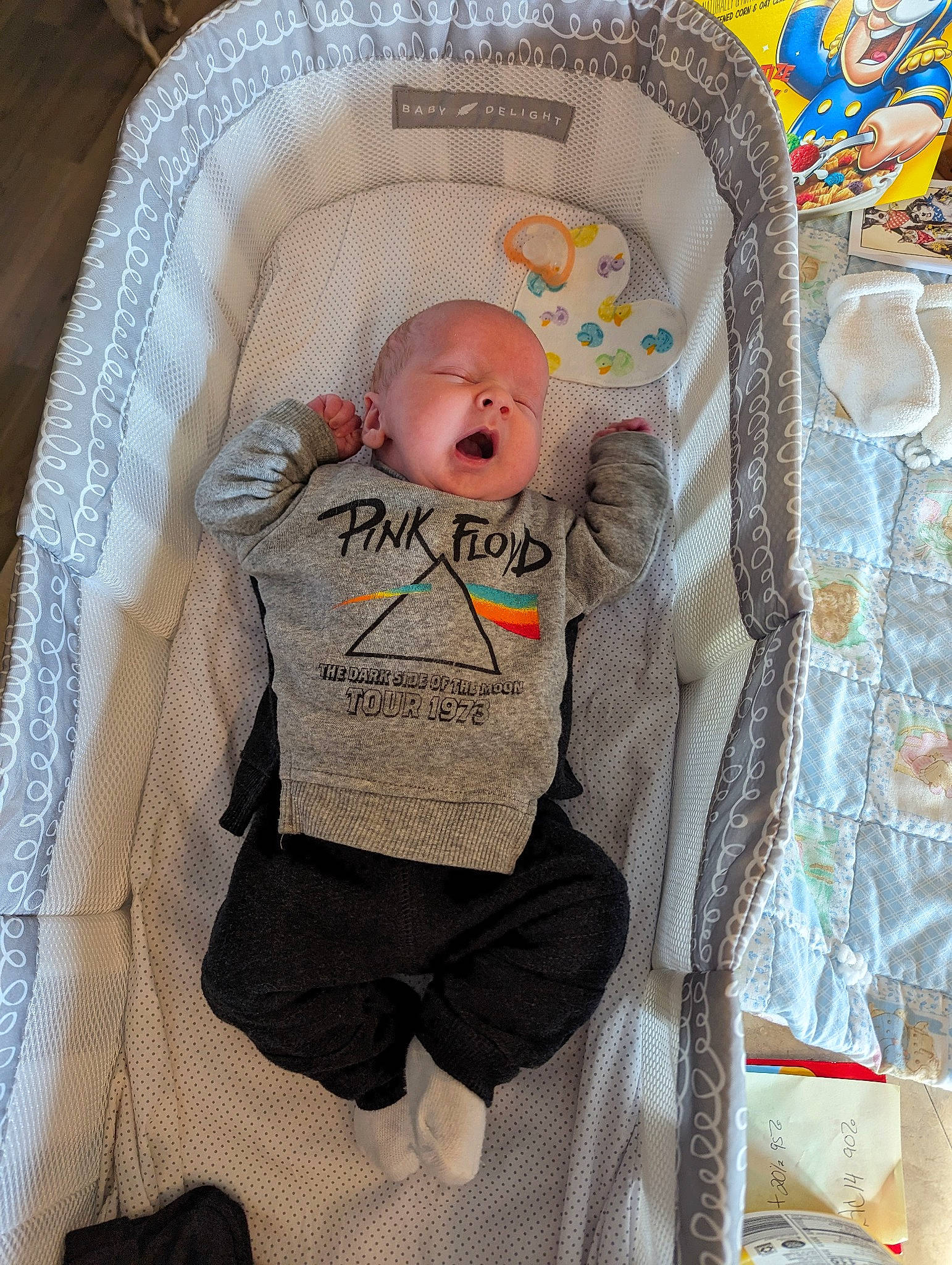 Rowen is registered to the contest to win money with this photo: baby, baby_carriage, baby_products, baby_safety, baby_sleeping, baby_toddler_clothing, baby_toys, child, comfort, cradle, fun, infant_bed, linens, pattern, person, room, sitting, toddler