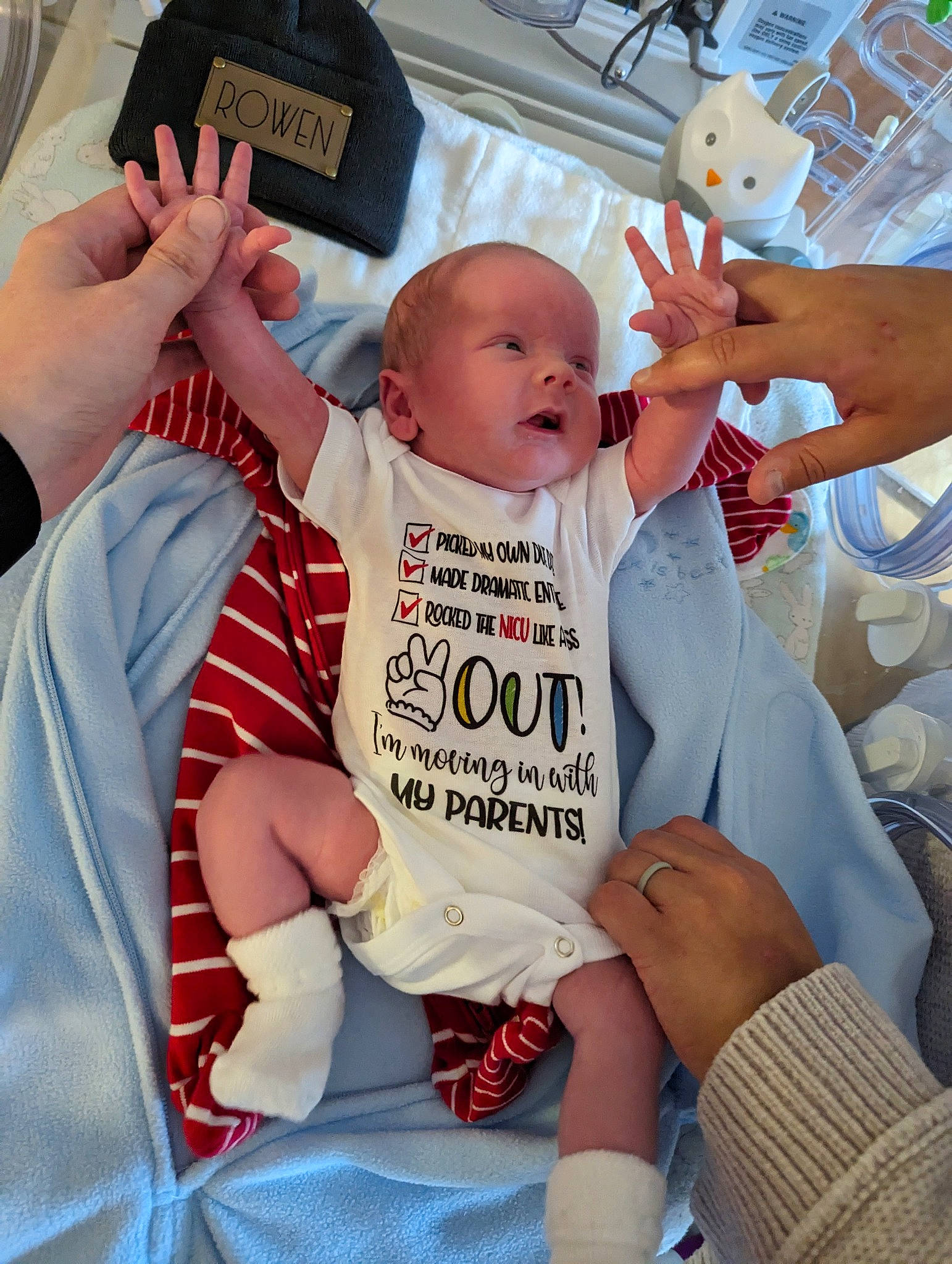 Rowen joined the competition — help win amazing prizes! arm, baby, baby_products, baby_toddler_clothing, child, comfort, event, finger, gesture, hand, health_care, knee, medical_procedure, nail, person, service, sitting, t_shirt, thigh, thumb