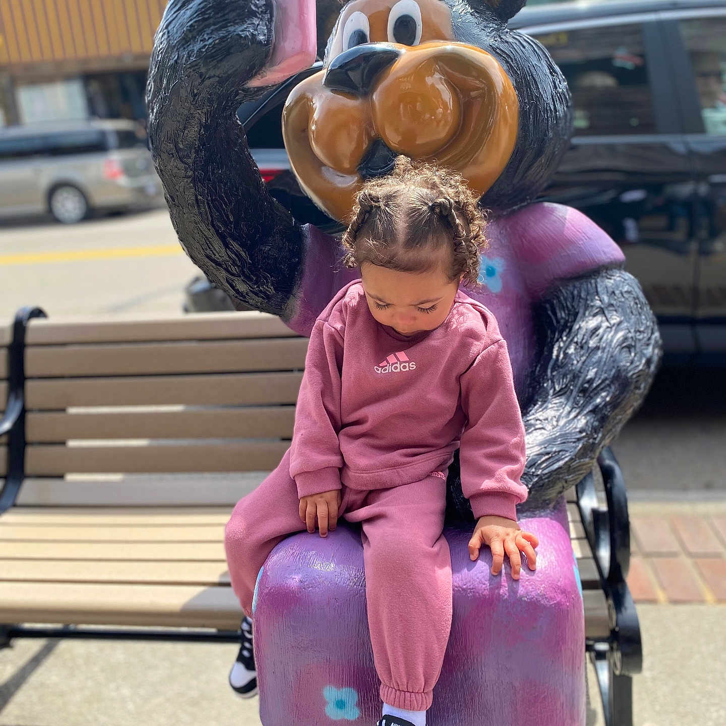 Aubrea joined the competition — help win amazing prizes! bench, child, city, clothing, face, female, footwear, furniture, girl, grass, head, nature, pants, person, photography, portrait, purple, shoe, sitting, urban