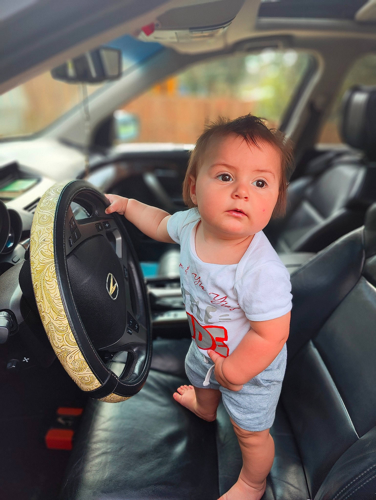 Sequoyah joined the competition — help win amazing prizes! auto_part, automotive_design, automotive_exterior, automotive_lighting, automotive_mirror, automotive_tire, automotive_wheel_system, car, car_seat, car_seat_cover, family_car, flash_photography, motor_vehicle, person, personal_luxury_car, rear_view_mirror, steering_part, steering_wheel, surprise, toddler