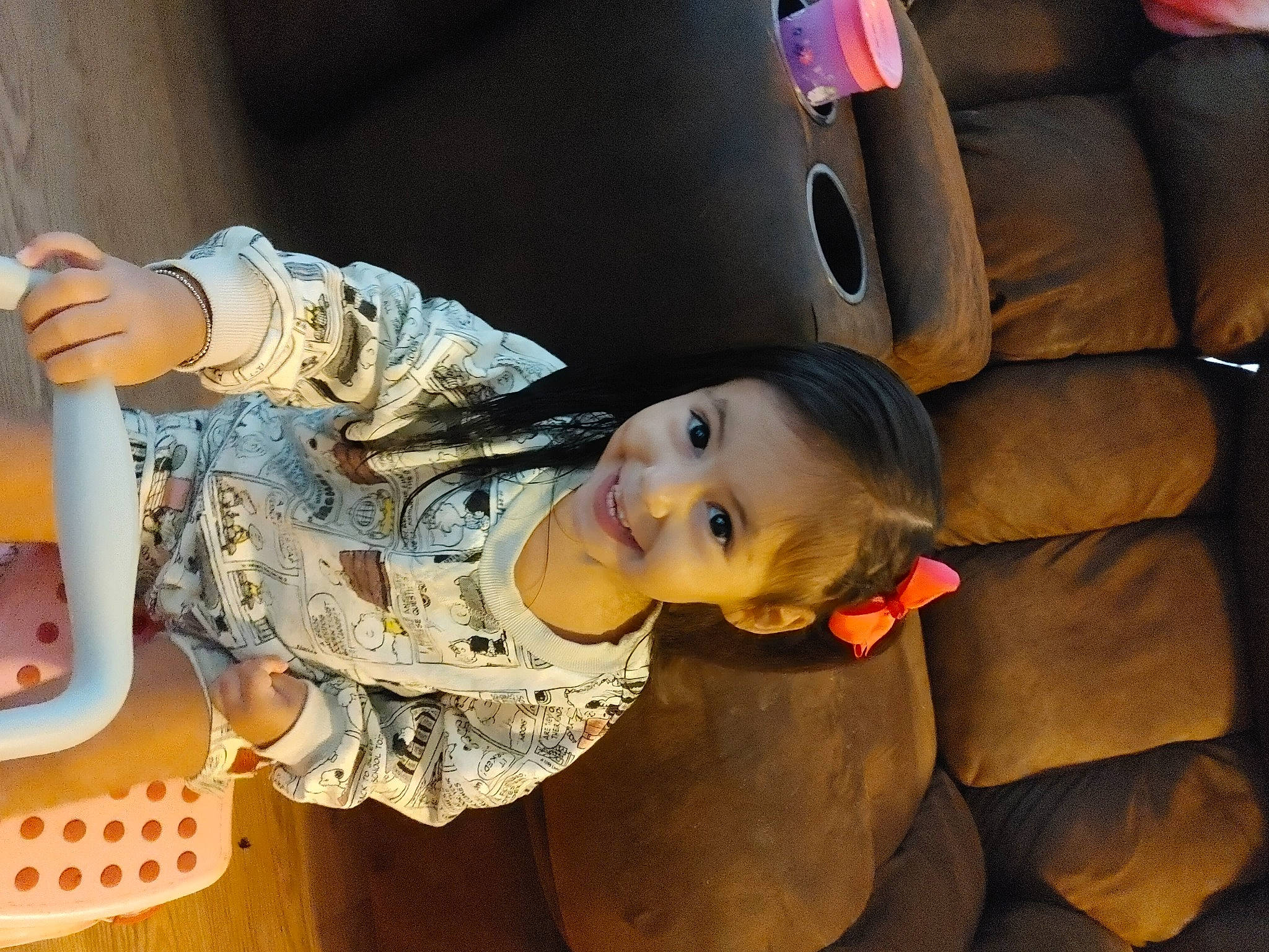 Katori is registered to the contest to win money with this photo: auto_part, baby, car_seat, car_seat_cover, child, comfort, flooring, fun, hat, headgear, helmet, human_leg, joy, person, personal_protective_equipment, plant, room, sitting, toddler, vehicle_door