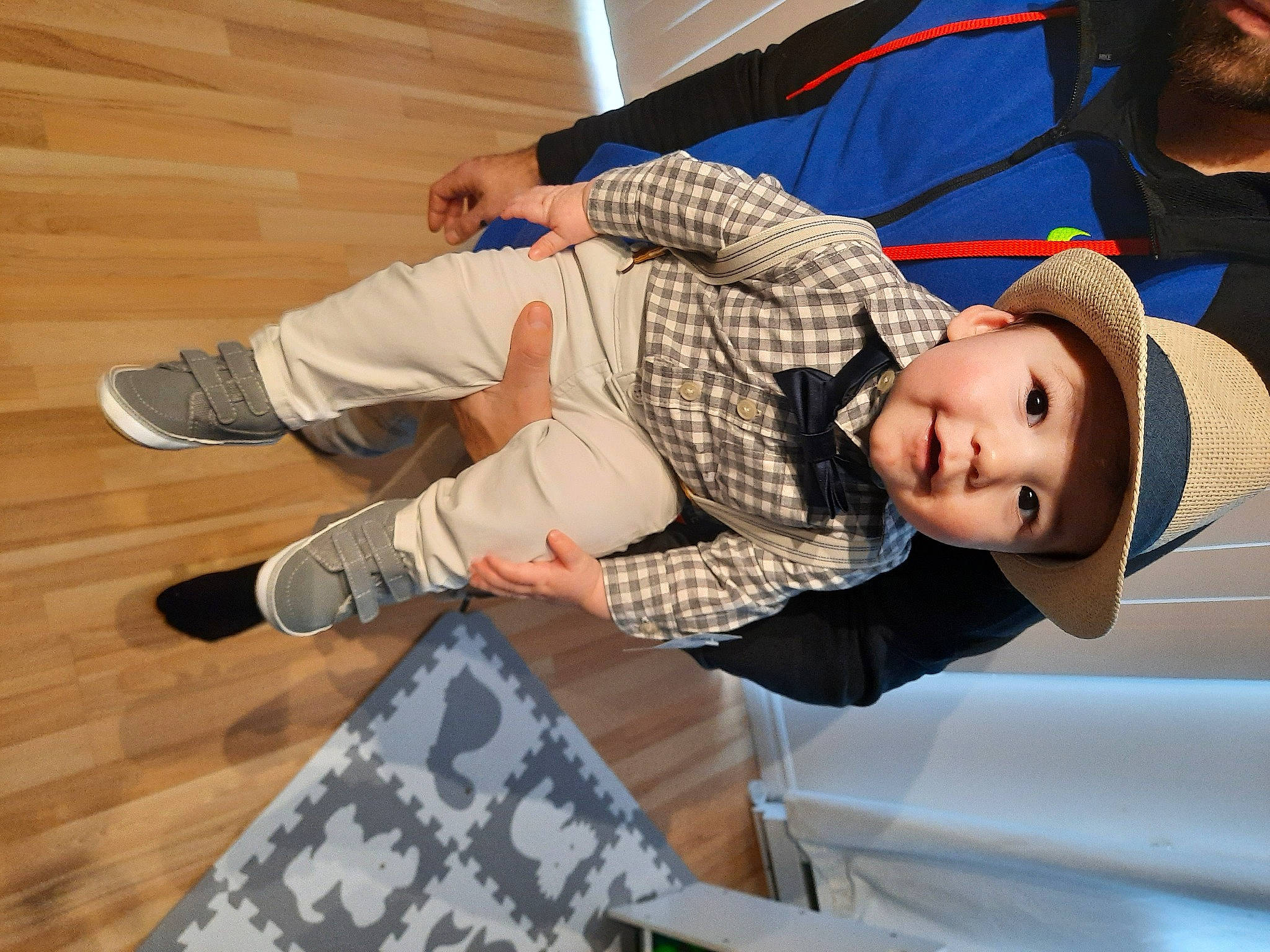 Mayson participe au concours pour gagner de l'argent avec cette photo : baby, baby_toddler_clothing, bonnet, camouflage, hardwood, headwear, laminate_flooring, military_camouflage, outdoor_shoe, person, plaid, sock, walking_shoe, wood_flooring