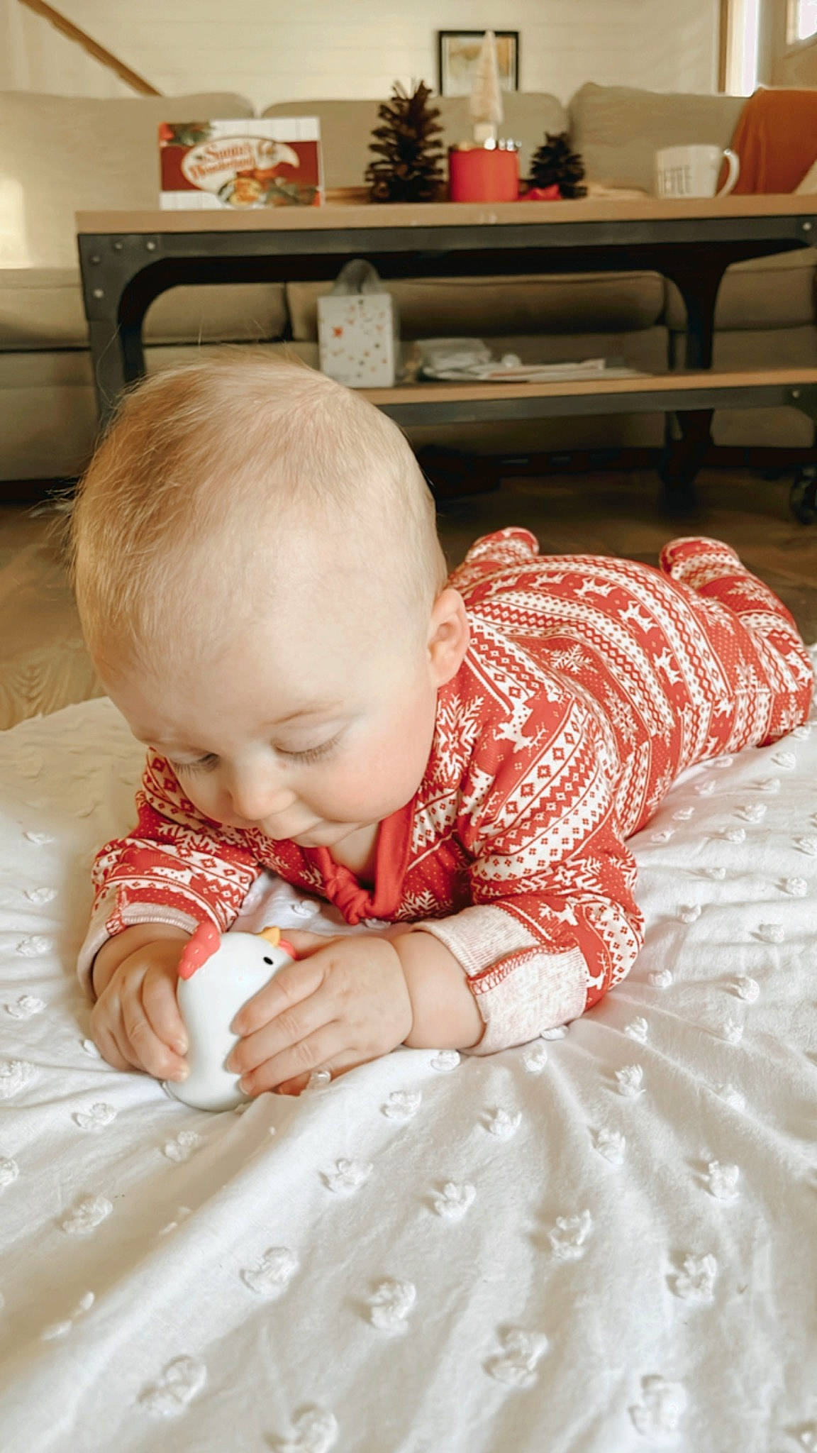 Kash is registered to the contest to win money with this photo: baby, baby_toddler_clothing, chair, cheek, chin, comfort, eye, face, facial_expression, finger, floor, flooring, hairstyle, linens, pattern, person, skin, sleeve, toddler, vertebrate