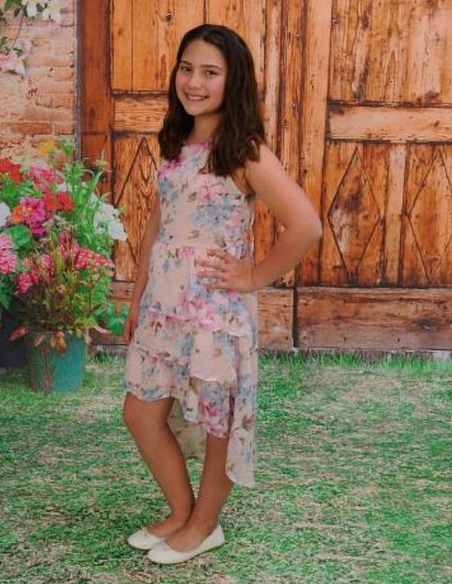 Kayla joined the competition — help win amazing prizes! clothing, dress, fawn, joy, lady, leg, long_hair, pattern, peach, person, photo_shoot, pink, shoe, shoulder, summer, thigh