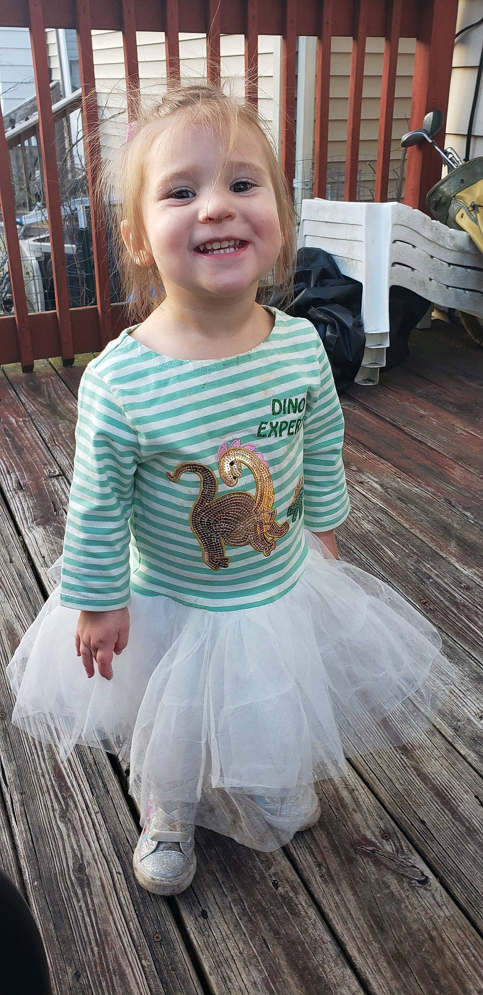 Kensi is registered to the contest to win money with this photo: baby_products, baby_toddler_clothing, ballet_tutu, child, clothing, costume, dress, joy, owl, person, product, sleeve, smile, t_shirt, toddler, turquoise