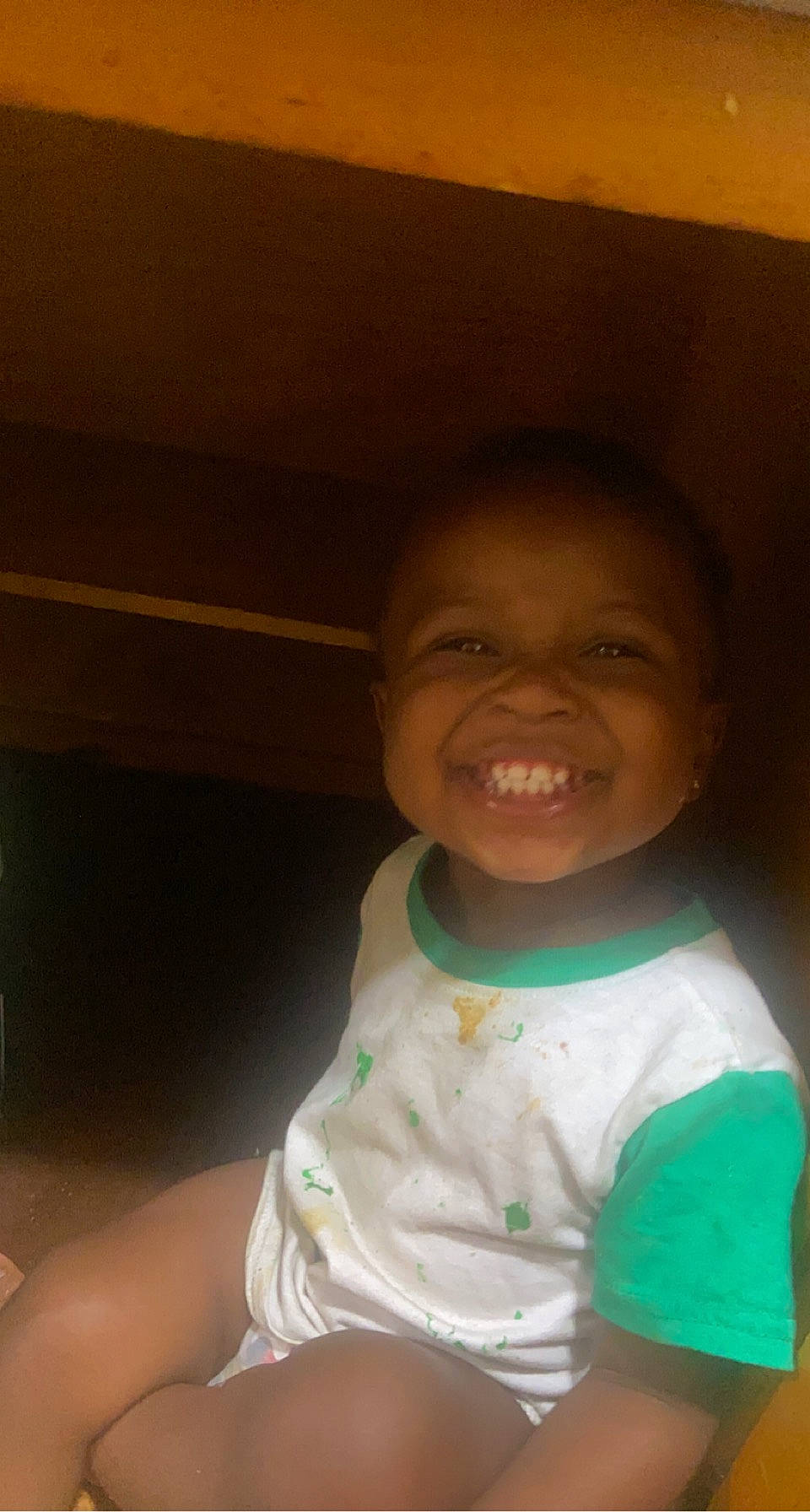 Tristian is registered to the contest to win money with this photo: baby, baby_toddler_clothing, cheek, child, elbow, gesture, happy, human_body, jaw, joy, lip, mouth, neck, nose, person, shoulder, skin, sleeve, smile, tints_and_shades