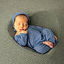 Keyvan a rejoint le concours — aidez-le/la à gagner de superbes lots ! newborn, baby, sleeping, blue_outfit, bonnet, knitwear, cozy, blanket, textured, olive_green, infant, cute, peaceful, portrait, resting, small_feet, hand, soft_lighting, indoors, child
