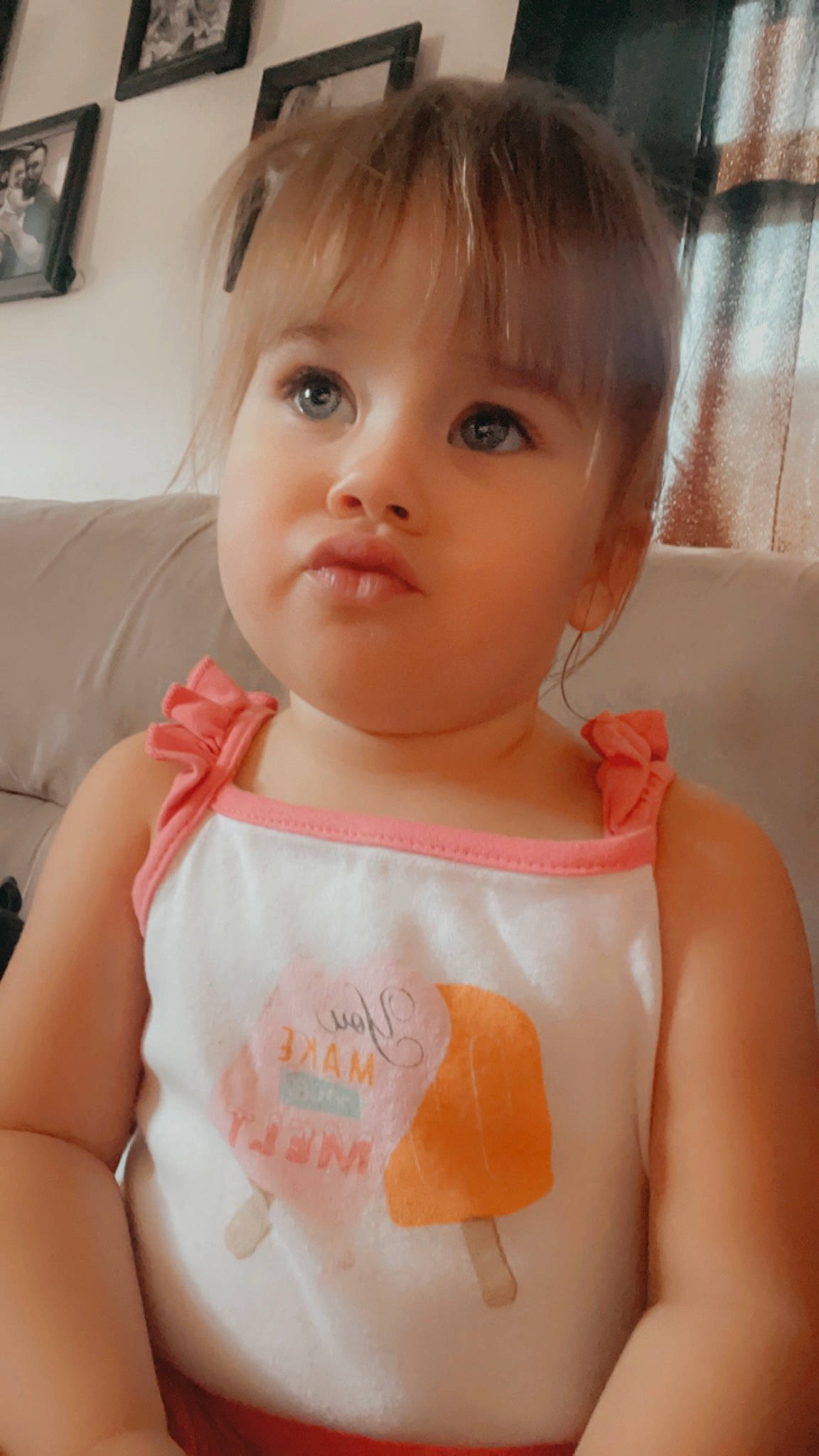 Eloise is registered to the contest to win money with this photo: active_tank, baby_toddler_clothing, bathing, cheek, chest, child, eyelash, face, happy, human_body, lip, mouth, neck, nose, person, picture_frame, pink, product, skin, sleeve