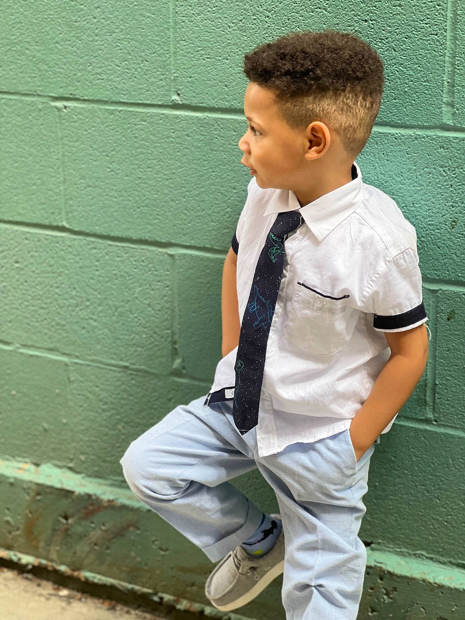 Jaquavon joined the competition — help win amazing prizes! child, collar, cool, dress_shirt, elbow, formal_wear, grass, happy, knee, leisure, pattern, person, sitting, sleeve, sneakers, sportswear, street_fashion, t_shirt, tie, toddler