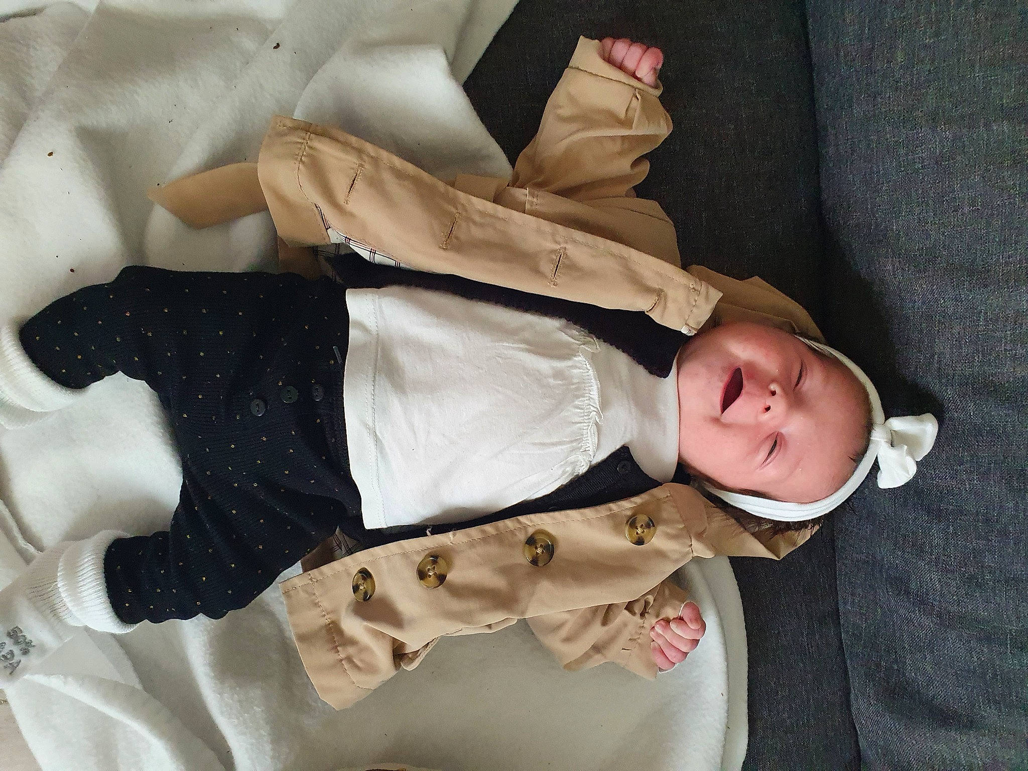 Yelena participe au concours pour gagner de l'argent avec cette photo : baby, baby_products, baby_toddler_clothing, beige, child, collar, comfort, dress_shirt, face, hat, khaki_pants, linens, person, sleeve, textile, toddler, wood