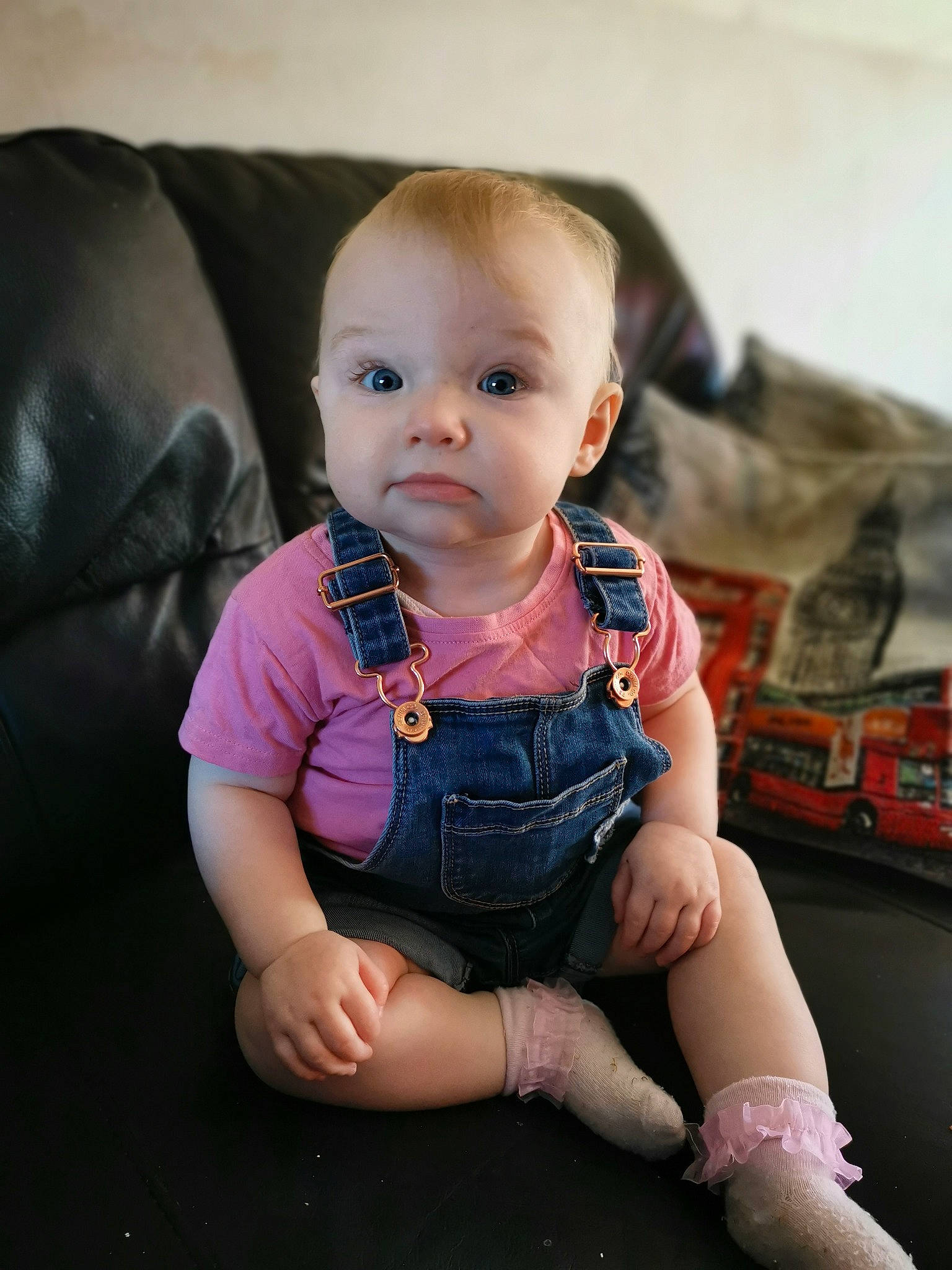 Isobel is registered to the contest to win money with this photo: baby, cheek, child, chin, eye, face, head, leg, lip, person, pink, sitting, skin, smile, toddler