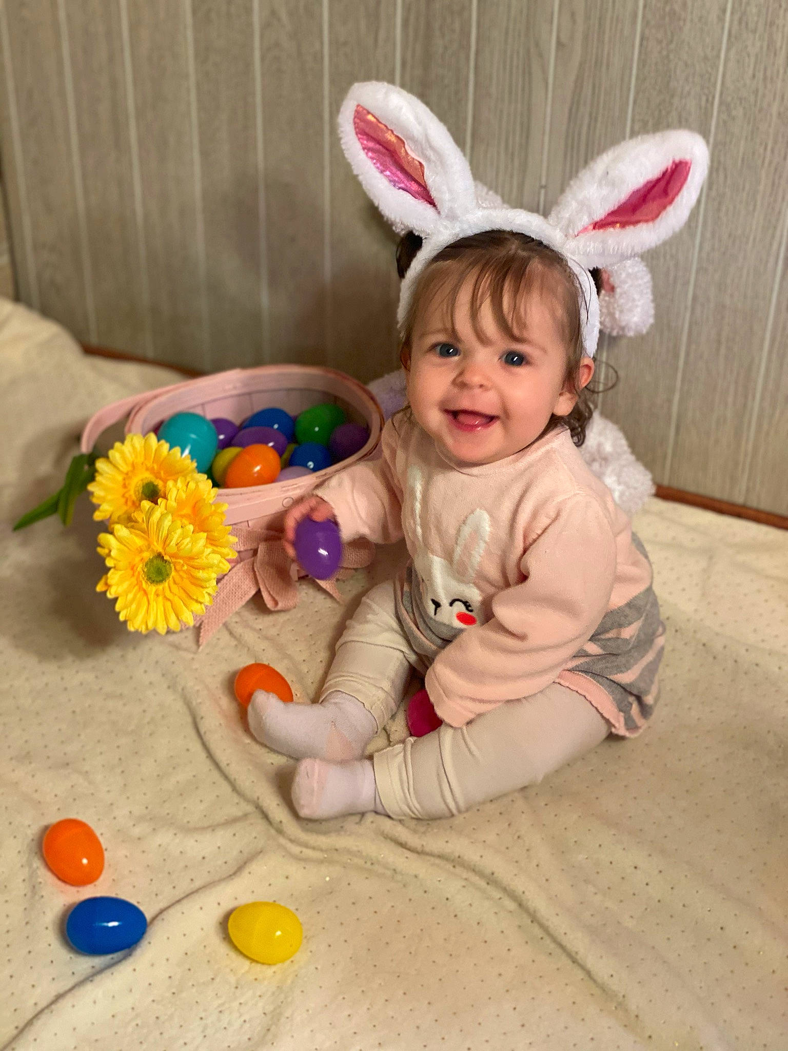 Lucie is registered to the contest to win money with this photo: child, ear, easter, easter_bunny, easter_egg, holiday, joy, person, play, rabbit, rabbits_and_hares, toddler