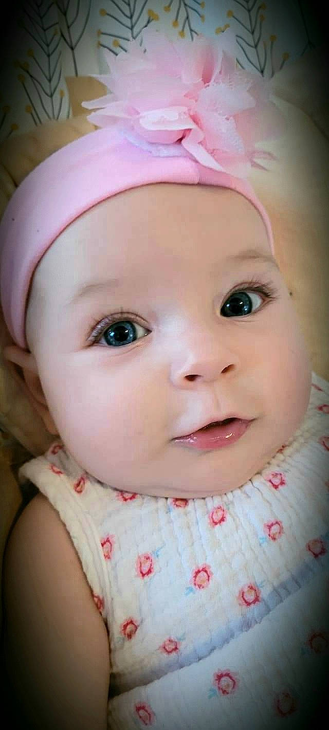 Willow is registered to the contest to win money with this photo: baby, baby_toddler_clothing, cap, cheek, child, chin, dress, eye, eyebrow, eyelash, happy, headwear, iris, lip, nose, person, pink, skin, sleeve, smile