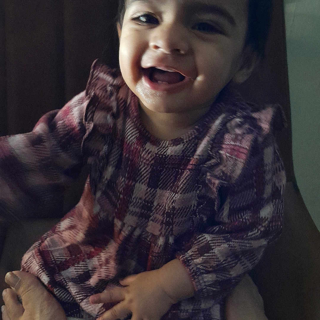 Kohinoor joined the competition — help win amazing prizes! baby, babylaughing, bodypart, chair, clothing, face, finger, furniture, hand, happy, head, laughing, mouth, pants, person, photography, portrait, sitting, smile, teeth