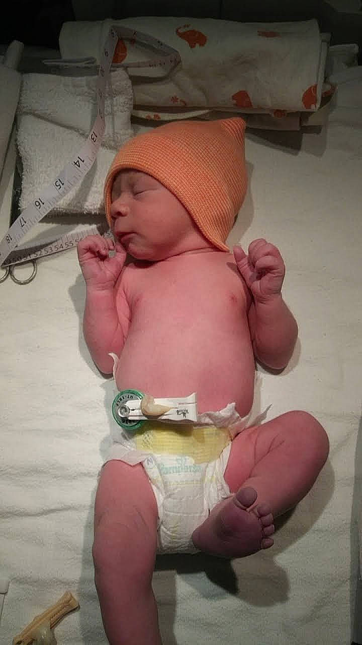 Tayden is registered to the contest to win money with this photo: abdomen, baby, baby_sleeping, cheek, chest, comfort, diaper, eye, finger, hand, head, headwear, human_body, mouth, person, pink, skin, stomach, thigh, thumb