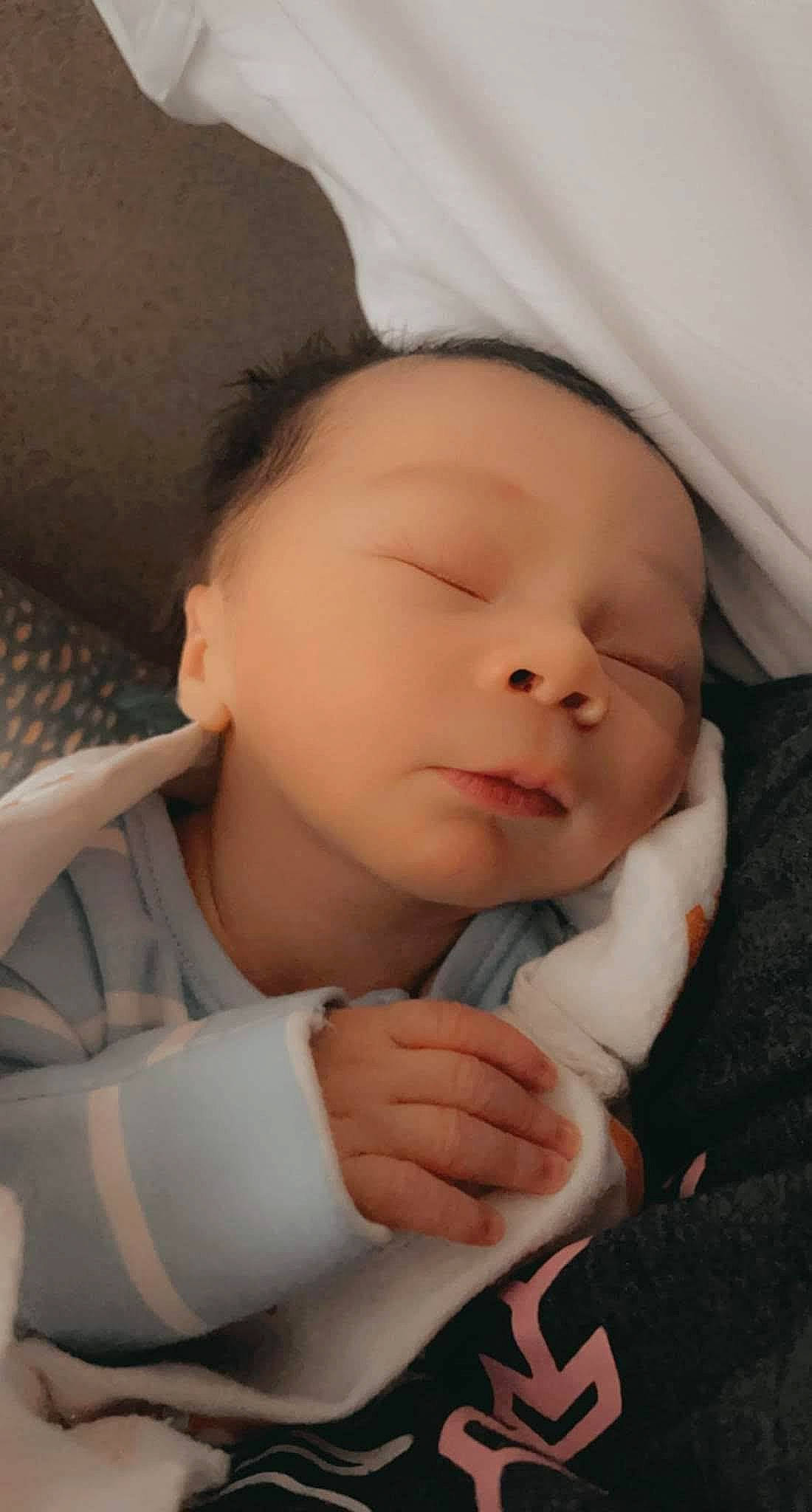 Tayden joined the competition — help win amazing prizes! baby, baby_sleeping, baby_toddler_clothing, cheek, child, chin, comfort, eye, eyebrow, eyelash, finger, gesture, linens, lip, nail, nose, person, skin, sleeve, thumb