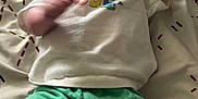Riot joined the competition — help win amazing prizes! baby, child, infant, smiling, lying_down, clothing, shorts, shirt, blanket, pattern, happy, face, hair, arm, legs, indoors, floor, cute, person, toddler