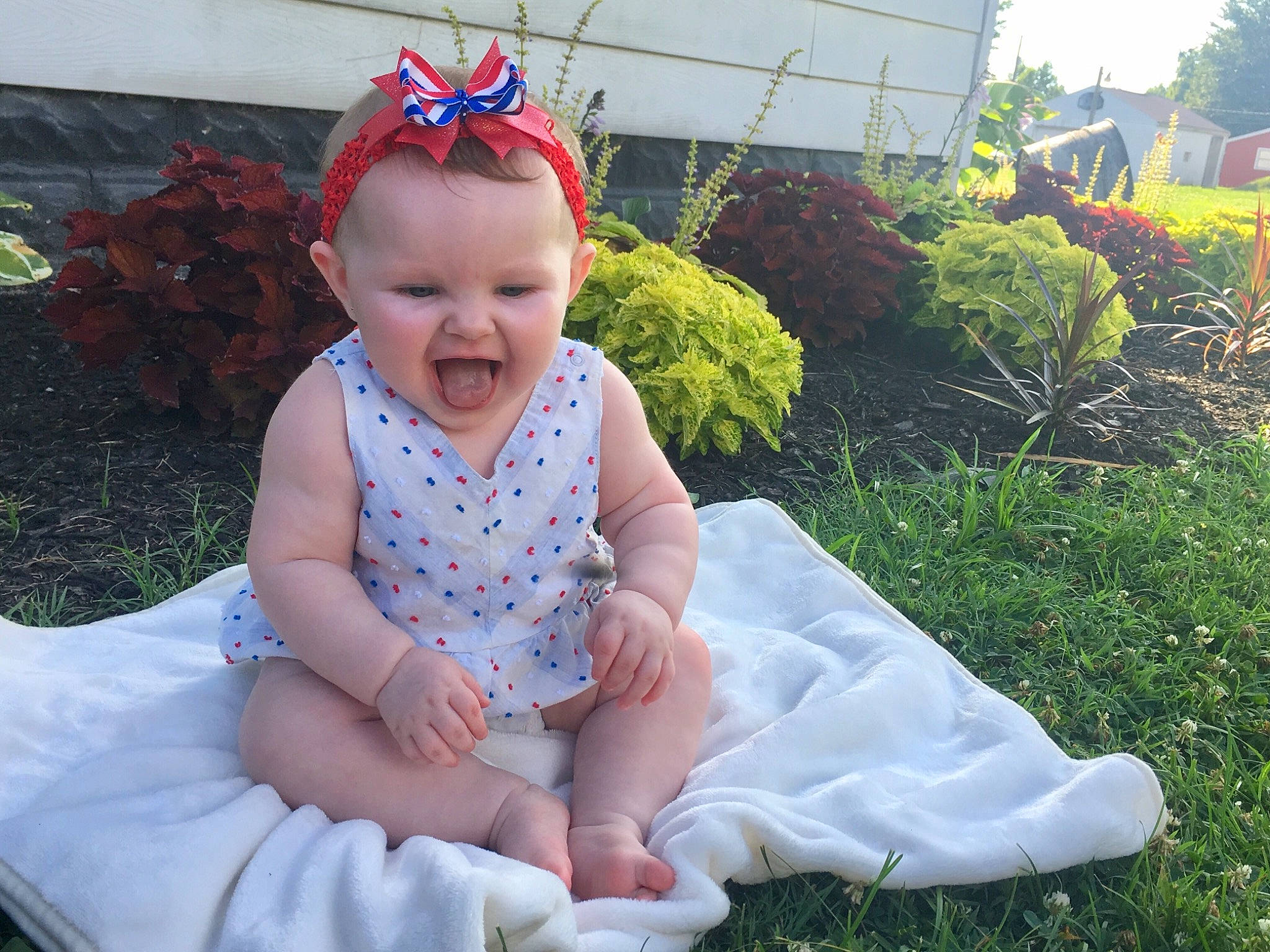 Kinsington joined the competition — help win amazing prizes! baby, baby_toddler_clothing, child, costume, dress, fashion_accessory, fun, grass, hair_accessory, head, headband, headgear, headpiece, person, pink, product, sitting, skin, smile, summer