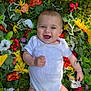 Jeanne participe au concours pour gagner de l'argent avec cette photo : baby, child, smiling, grass, flowers, white_onesie, cast, leg_cast, outdoor, nature, greenery, colorful, happy, infant, cute, person, portrait, laying_down, summer, playful