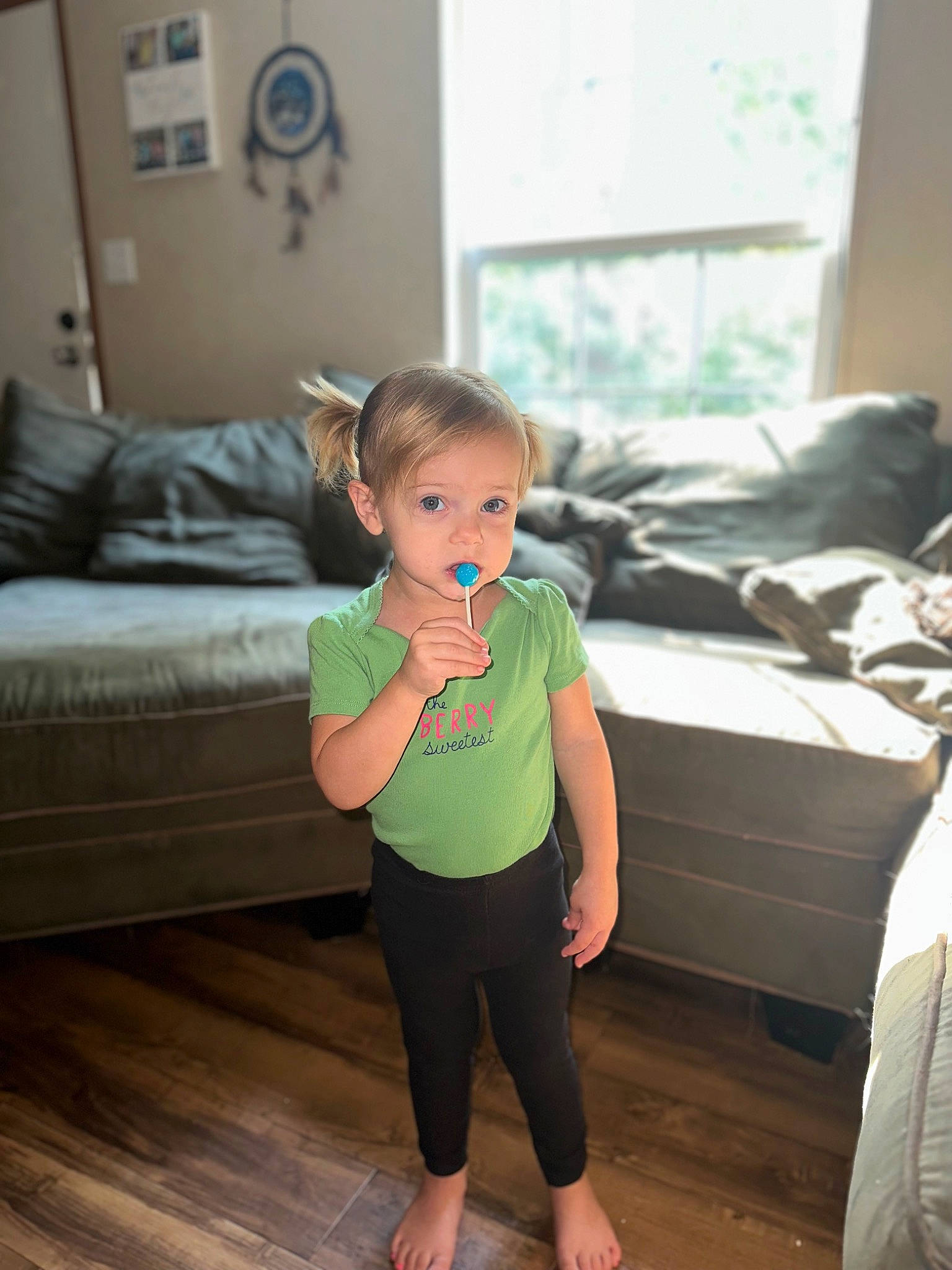 Ariya is registered to the contest to win money with this photo: baby_toddler_clothing, beauty, comfort, couch, eye, floor, flooring, fun, happy, hardwood, interior_design, living_room, person, skin, standing, t_shirt, thigh, toddler, trunk, waist