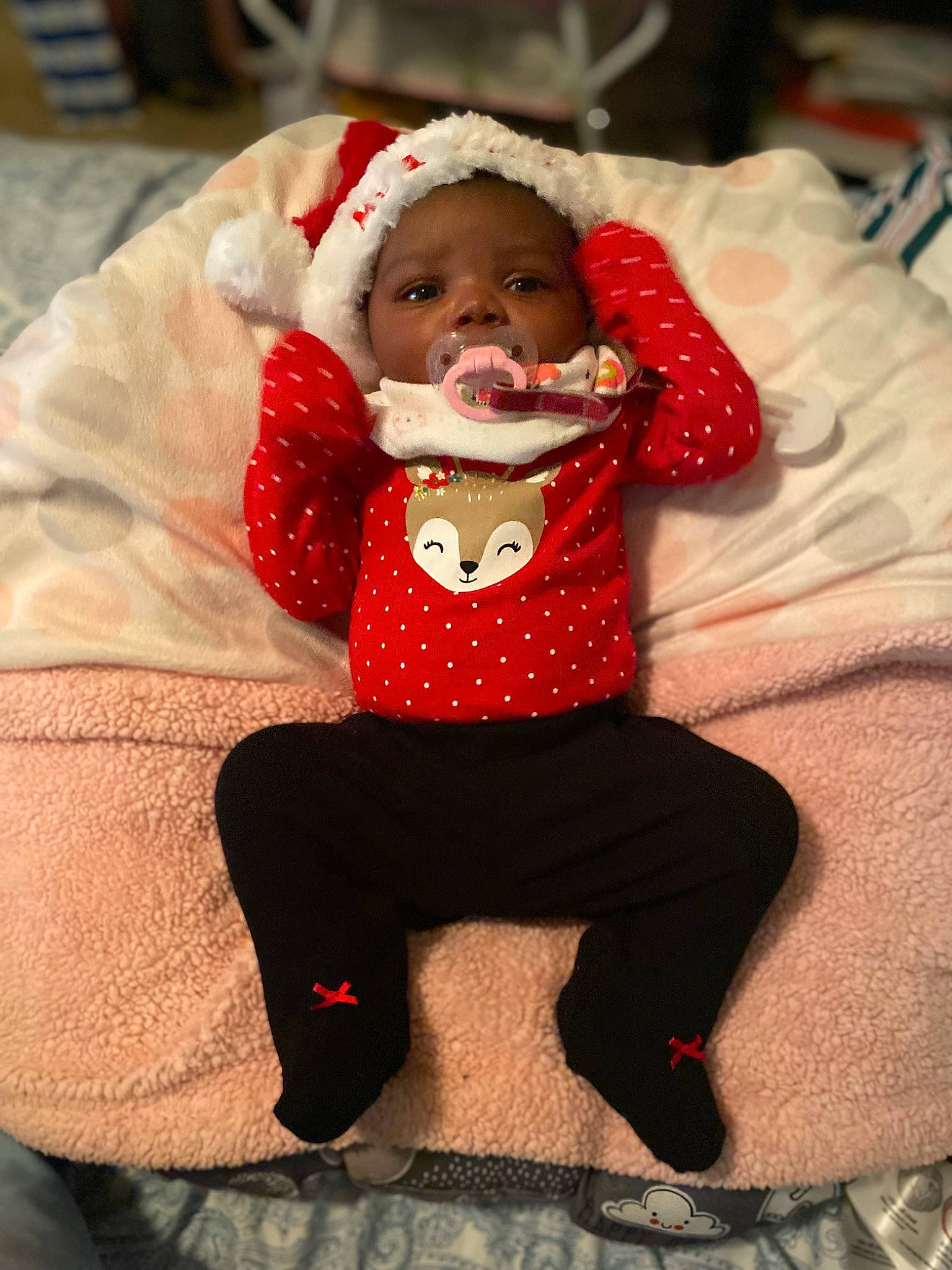 Imani joined the competition — help win amazing prizes! arm, baby, baby_toddler_clothing, cheek, chin, collar, dress, eye, face, facial_expression, head, headgear, headwear, human_body, lip, mammal, mouth, person, skin, sleeve