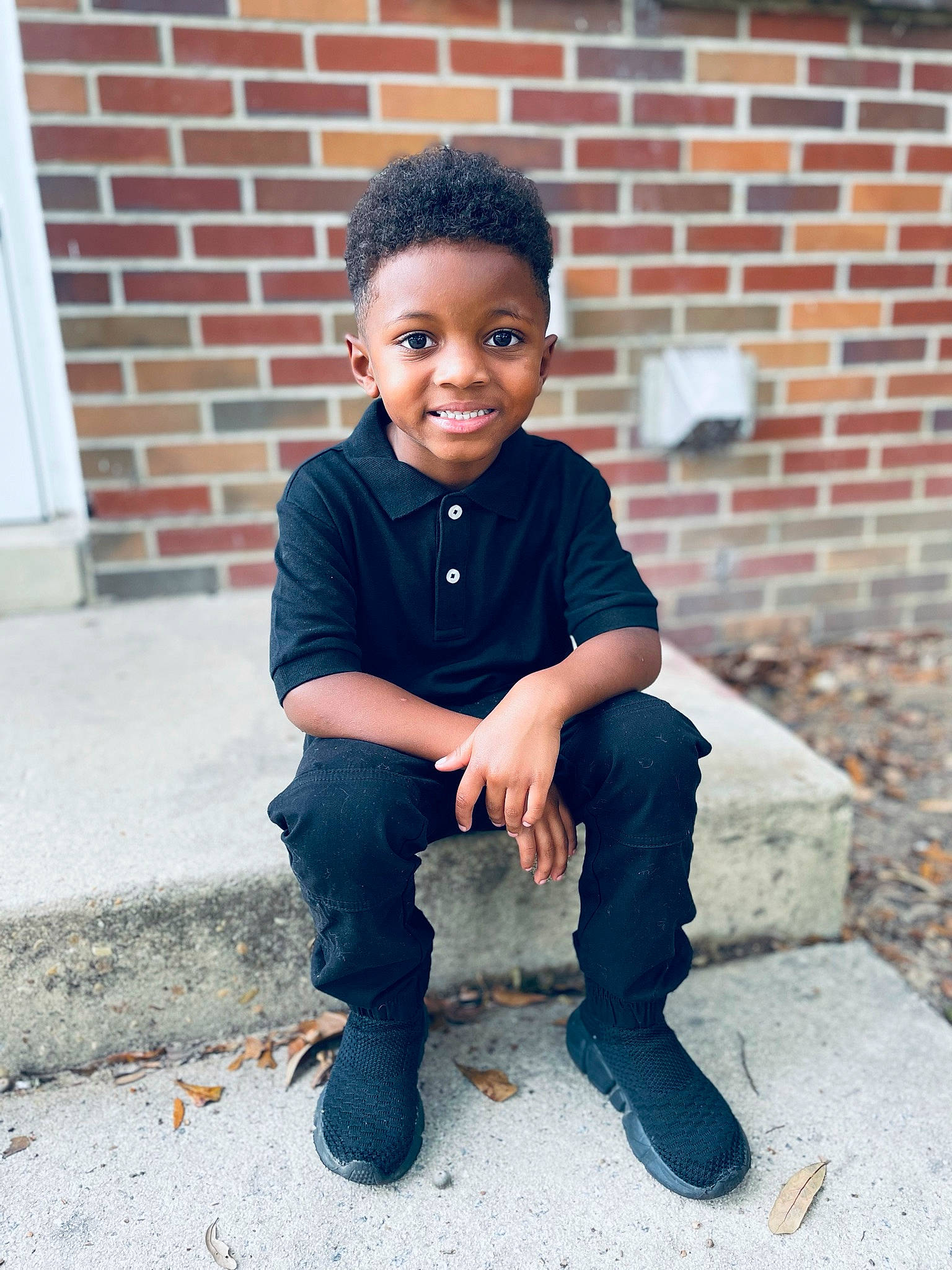 Ashton-amari joined the competition — help win amazing prizes! beauty, brick, brickwork, child, cool, denim, electric_blue, face, flash_photography, hair, happy, head, human, joy, person, sitting, sleeve, smile, standing, street_fashion