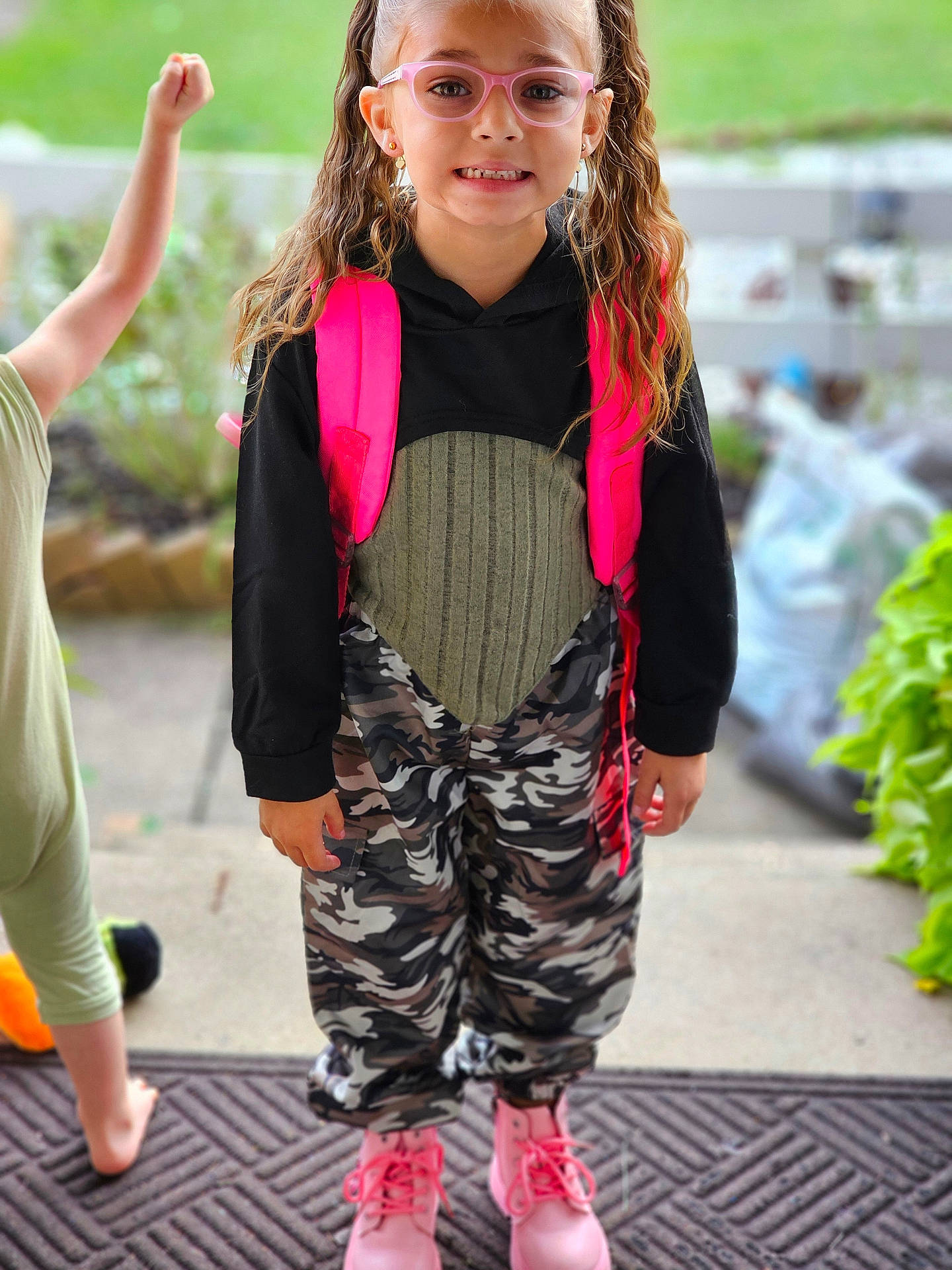 Delilah is registered to the contest to win money with this photo: bodypart, boy, child, clothing, face, female, footwear, girl, head, jeans, knitwear, male, pants, person, photography, portrait, shoe, shorts, sweater, vest