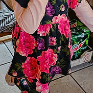 Delilah joined the competition — help win amazing prizes! child, girl, glasses, pink_bow, floral_dress, leggings, indoor, tile_floor, playful_pose, hand_over_mouth, smiling, footwear, casual_clothing, person, young, cute, fashion, happy, home, accessory