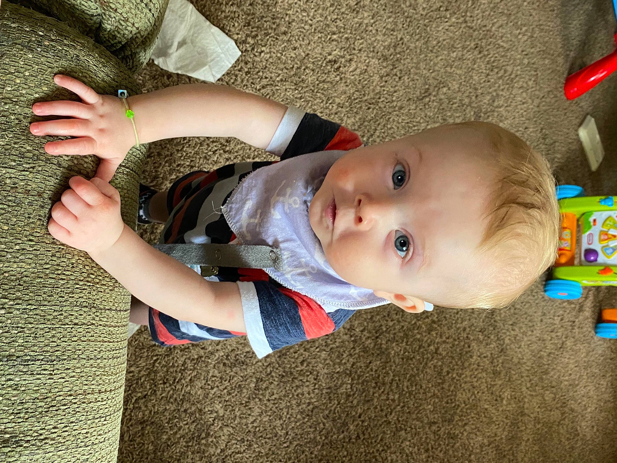 Emmitt is registered to the contest to win money with this photo: baby, baby_toddler_clothing, beauty, cheek, child, clothing, eye, gesture, grass, hairstyle, head, human_body, iris, leaf, nose, pattern, person, skin, sleeve, toddler