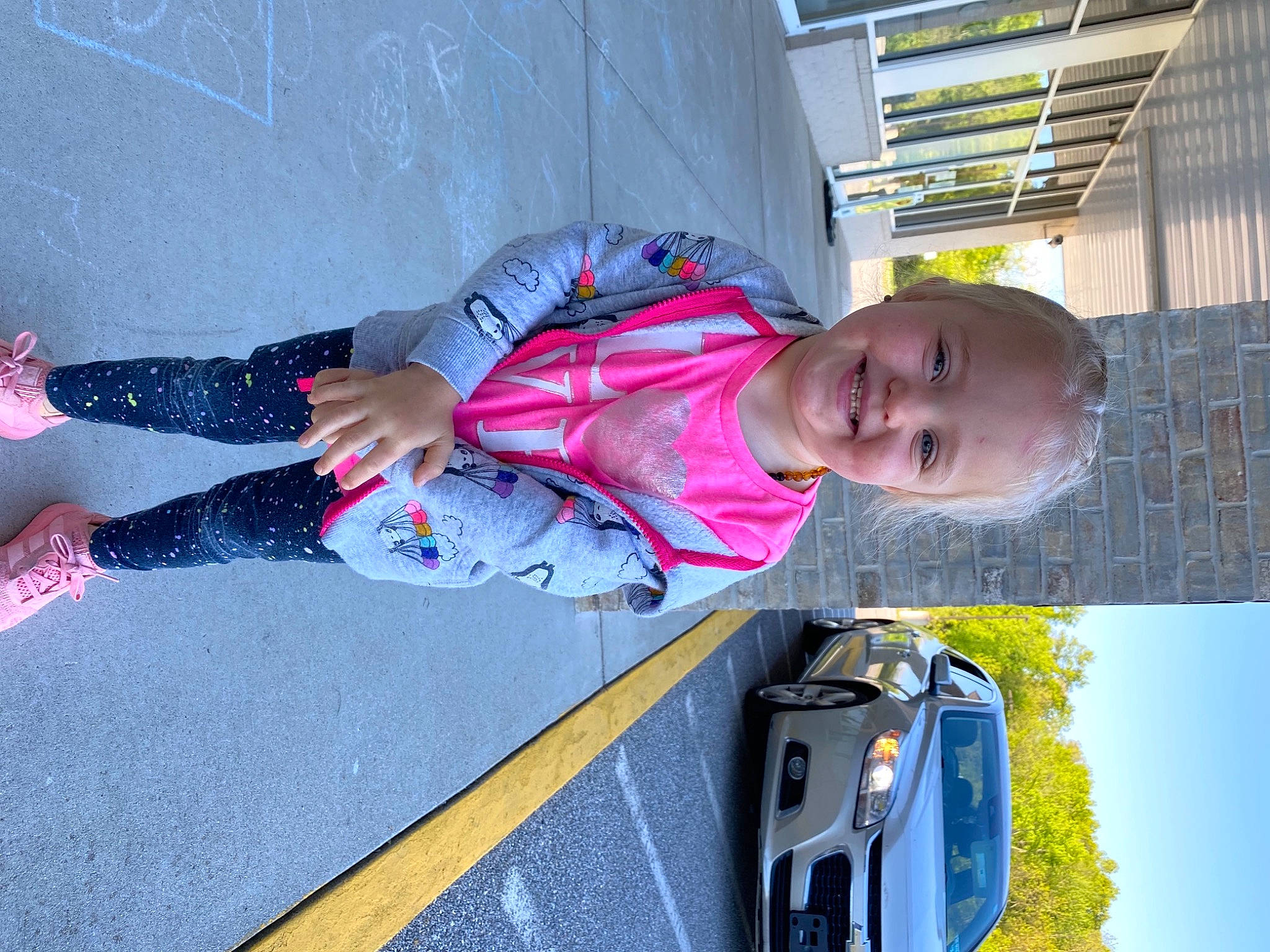 Zoey joined the competition — help win amazing prizes! automotive_exterior, automotive_lighting, automotive_mirror, car, child, electric_blue, hood, joy, land_vehicle, motor_vehicle, person, photograph, plant, product, smile, toddler, travel, tree, vehicle, vehicle_door