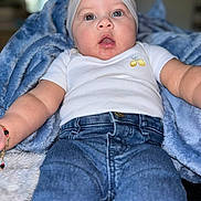 Jasslyn Feliciano joined the competition — help win amazing prizes! baby, bed, blanket, bodypart, clothing, face, finger, hand, head, jeans, newborn, pants, person, photography, portrait, quilt, sitting, sleeve, t_shirt, towel