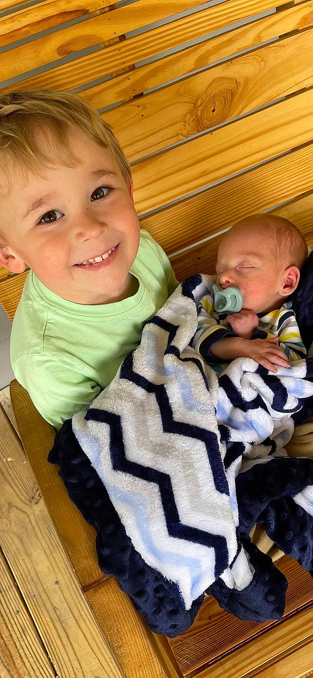 Benson is registered to the contest to win money with this photo: baby, baby_toddler_clothing, cheek, comfort, face, facial_expression, fun, happy, head, iris, joy, lap, mammal, nose, person, sitting, skin, sleeve, smile, t_shirt