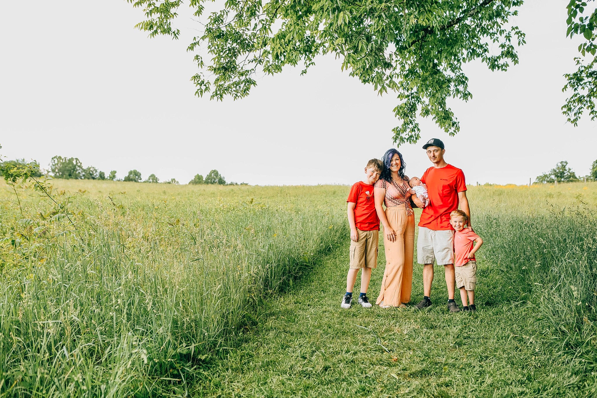 Jayden joined the competition — help win amazing prizes! agriculture, gesture, grass, grassland, happy, headwear, joy, landscape, leisure, meadow, natural_landscape, pasture, people_in_nature, person, plain, plant, plant_community, plantation, prairie, recreation