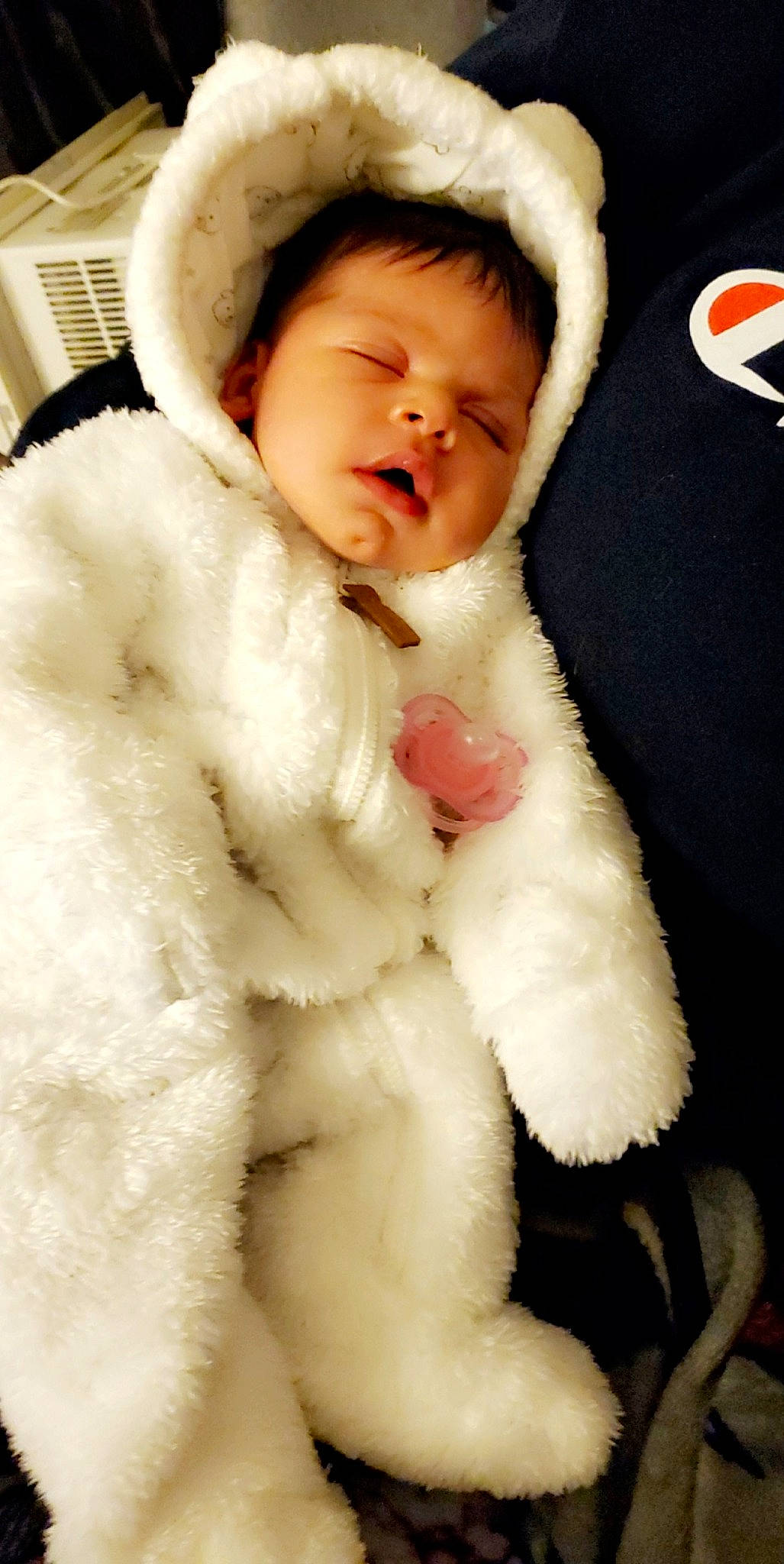 Sage is registered to the contest to win money with this photo: baby, cheek, child, fur, fur_clothing, headgear, outerwear, person, skin, textile, toddler
