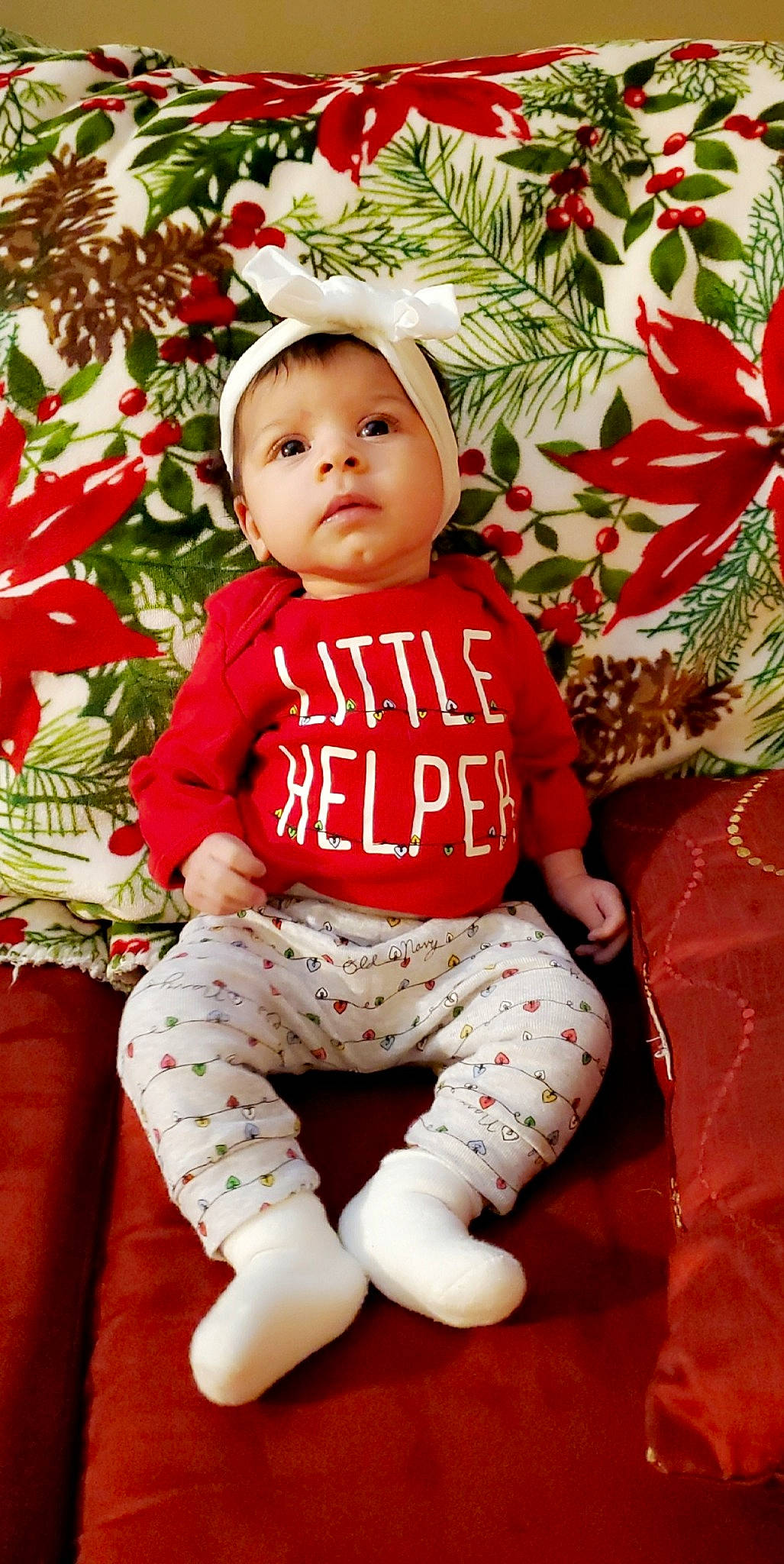 Sage is registered to the contest to win money with this photo: baby, baby_toddler_clothing, child, christmas, christmas_eve, person, red, toddler