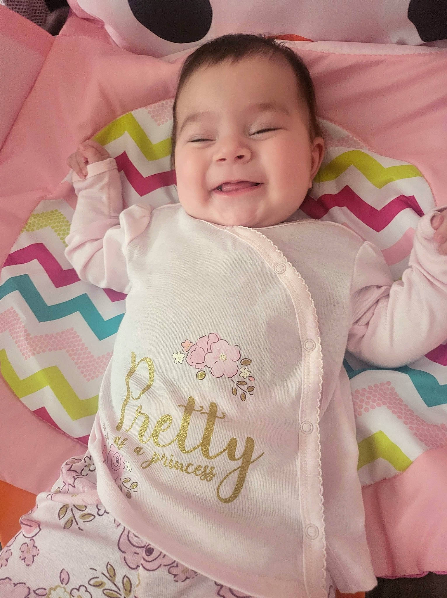Kylie is registered to the contest to win money with this photo: baby, baby_safety, baby_sleeping, baby_toddler_clothing, cheek, child, comfort, eye, hairstyle, happy, infant_bed, linens, person, pink, product, skin, sleeve, smile, textile, toddler
