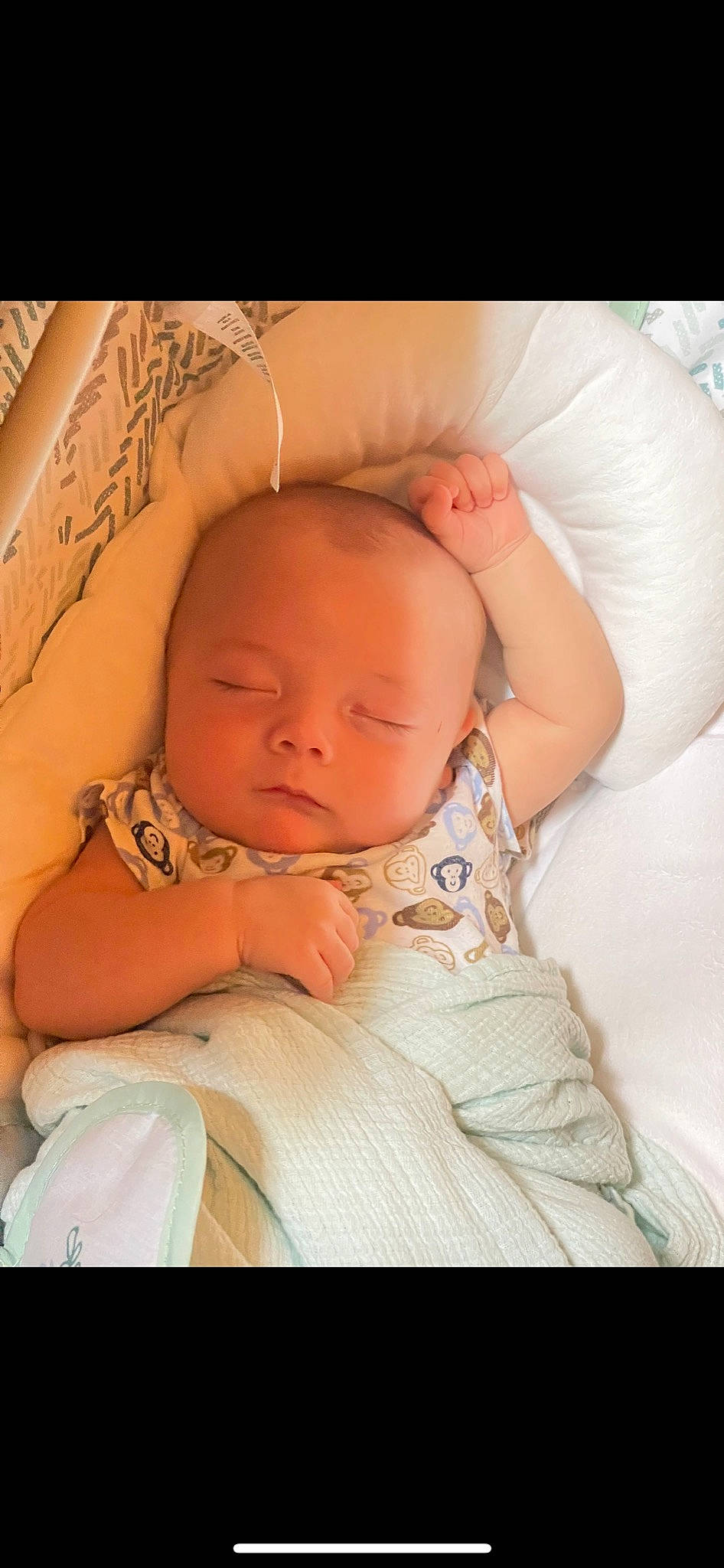 Leo is registered to the contest to win money with this photo: abdomen, baby, baby_sleeping, baby_toddler_clothing, cheek, comfort, eye, finger, flash_photography, gesture, hand, happy, human_body, iris, nose, person, skin, stomach, textile, toddler