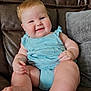 baby, blue_clothing, child, couch, cute, face, feet, furniture, hand, happy, home, indoor, infant, leather, mirror, pillow, polka_dot, portrait, sitting, smiling