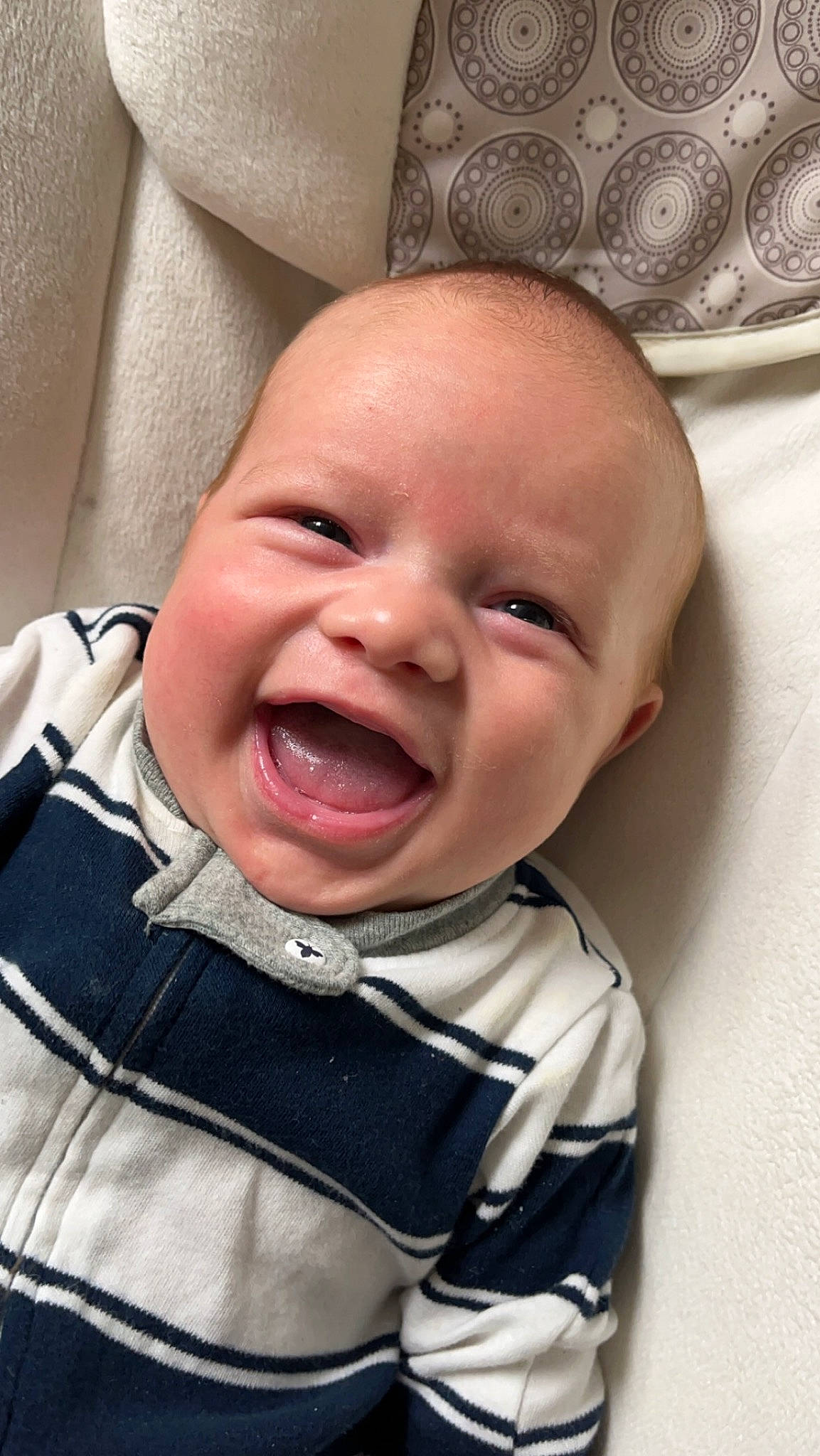Bode is registered to the contest to win money with this photo: baby, baby_toddler_clothing, cheek, chin, collar, eye, eyebrow, face, happy, head, iris, lip, mouth, nose, person, pink, skin, sleeve, smile, tongue