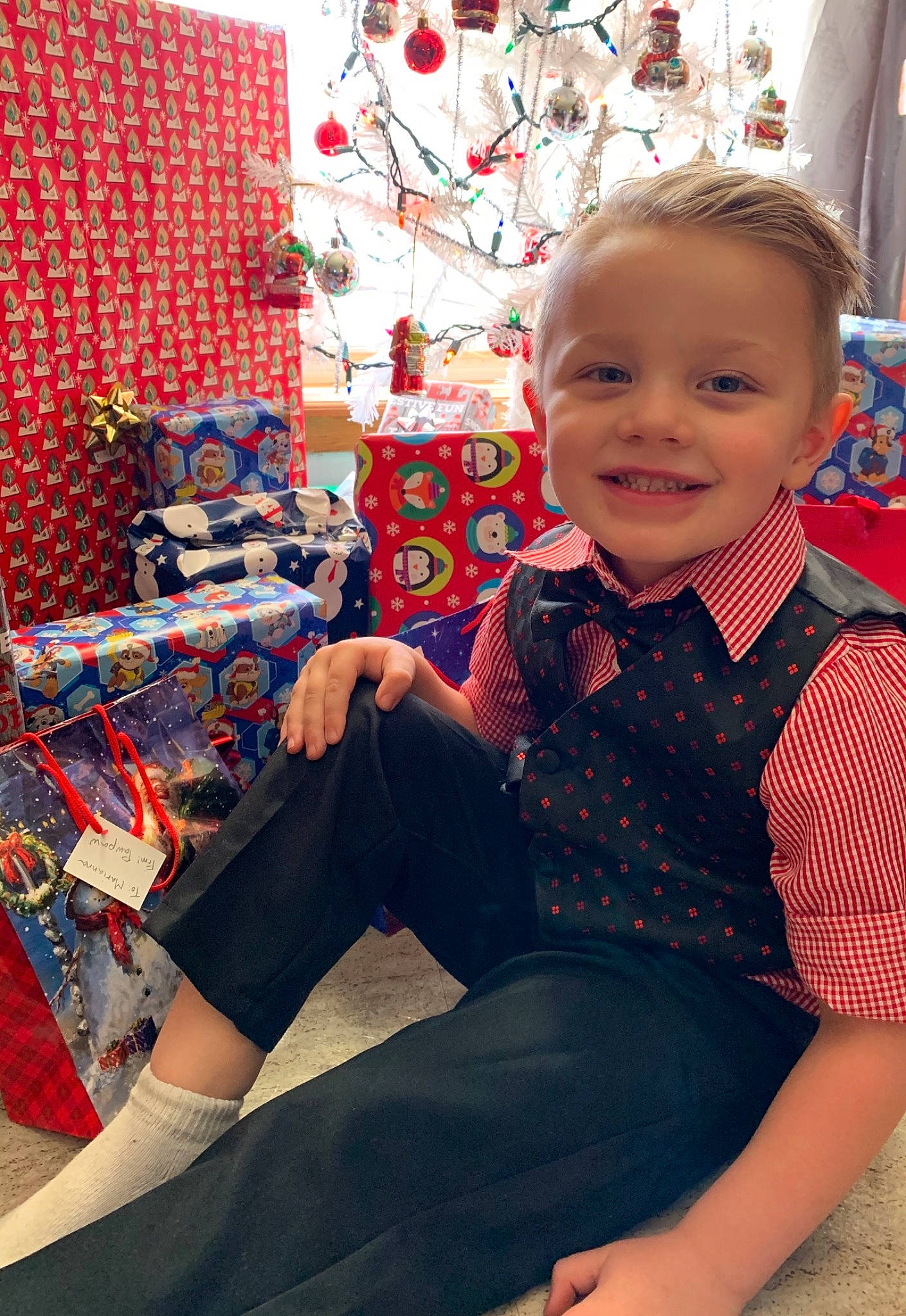 Raiden joined the competition — help win amazing prizes! baby, baby_laughing, baby_toddler_clothing, button, christmas, christmas_decoration, christmas_eve, christmas_ornament, creative_arts, denim, ear, holiday, holiday_ornament, joy, lap, ornament, overall, person, sitting, sock