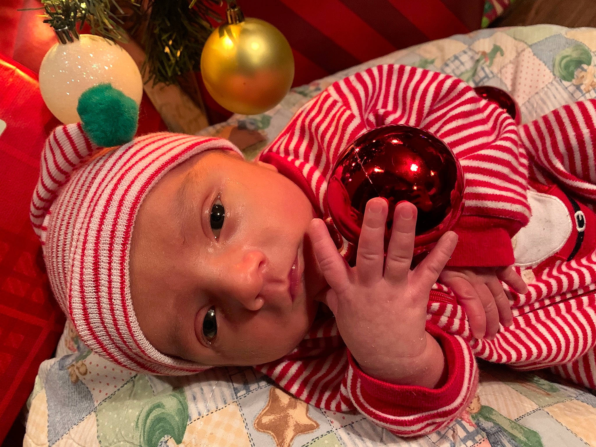 Owen joined the competition — help win amazing prizes! baby, baby_toddler_clothing, ball, child, christmas, christmas_decoration, christmas_eve, christmas_lights, christmas_ornament, christmas_tree, headwear, holiday, holiday_ornament, linens, ornament, party_supply, person, sphere, toddler, toy