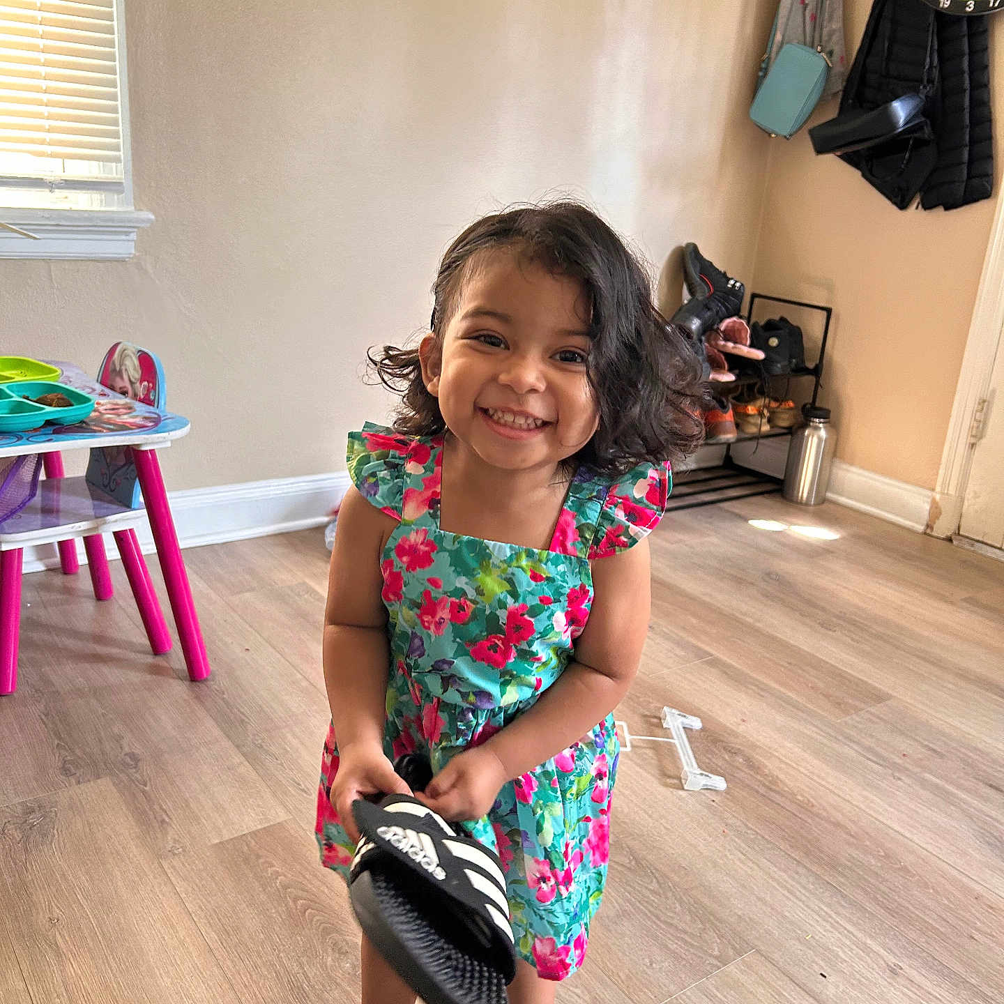 Samira Murphy joined the competition — help win amazing prizes! child, clothing, face, female, footwear, furniture, girl, hardwood, head, indoors, interiordesign, person, photography, portrait, sandal, shoe, sitting, sneaker, table, wood