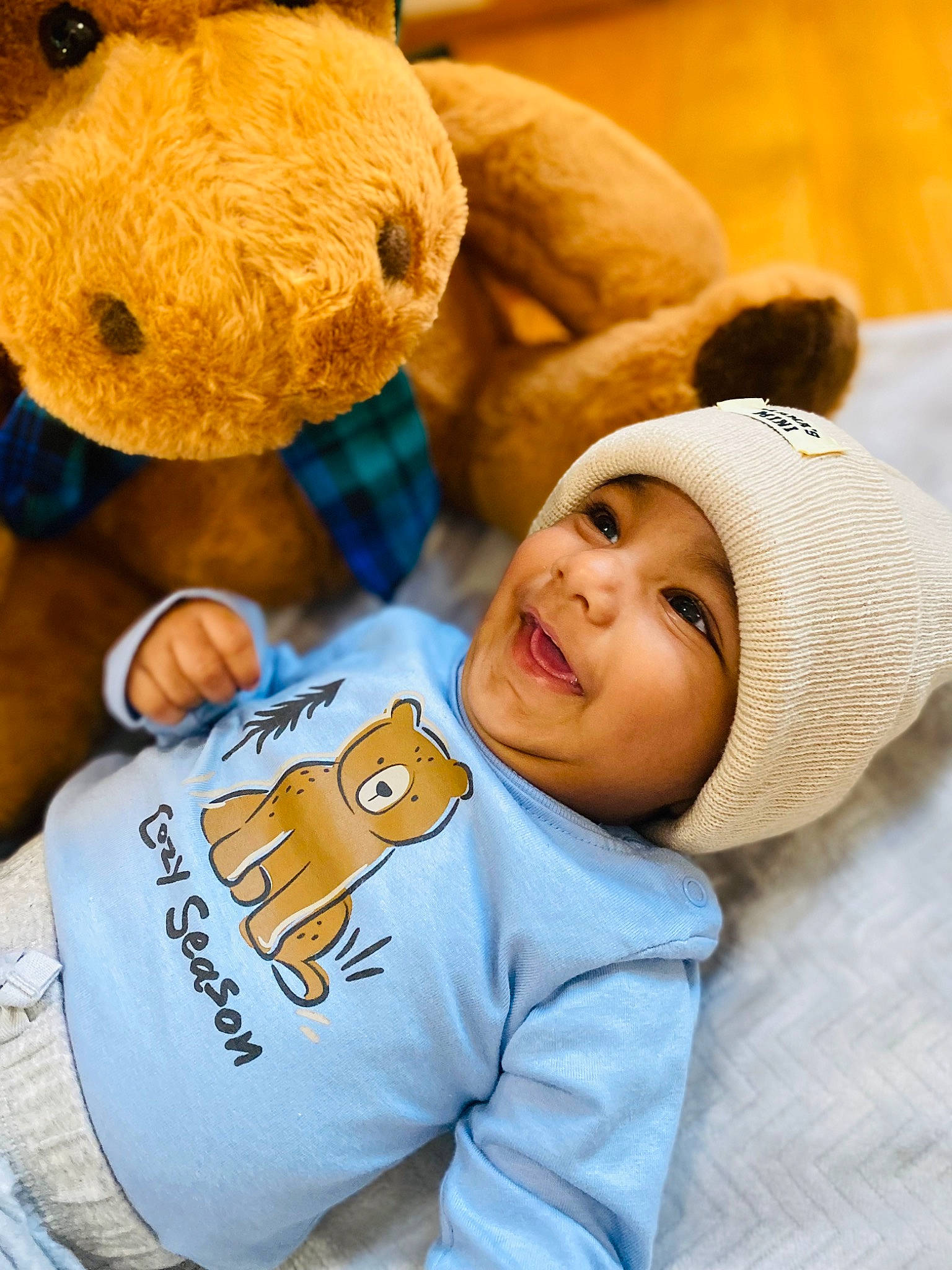 Chris joined the competition — help win amazing prizes! baby, baby_sleeping, baby_toddler_clothing, child, comfort, happy, hat, head, headwear, mammal, nose, person, skin, sleeve, smile, stuffed_toy, textile, toddler, toy, vertebrate