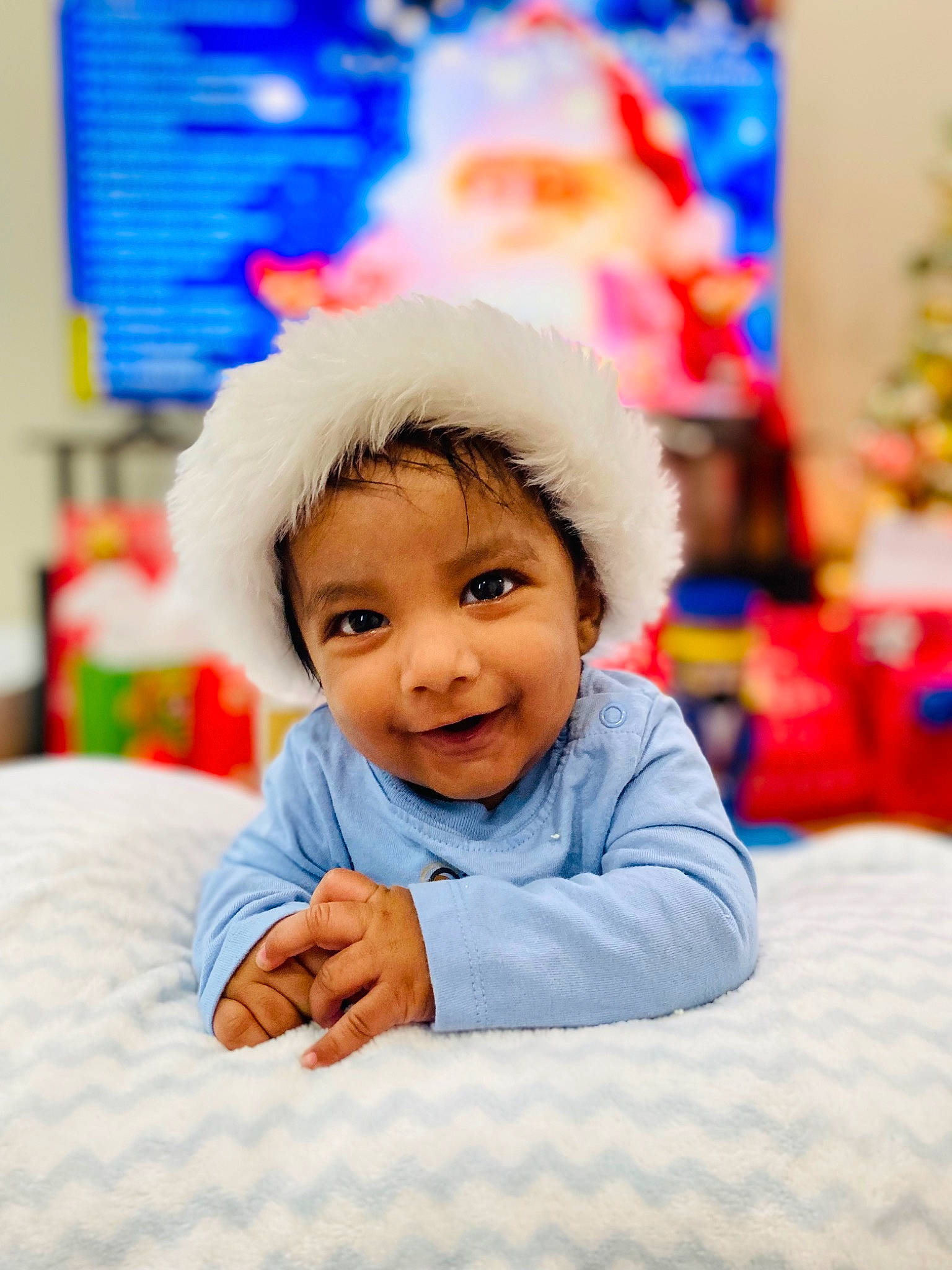 Chris is registered to the contest to win money with this photo: baby, baby_playing_with_toys, baby_toddler_clothing, child, comfort, event, flooring, fun, happy, holiday, laugh, leisure, person, play, recreation, room, sitting, sleeve, smile, toddler