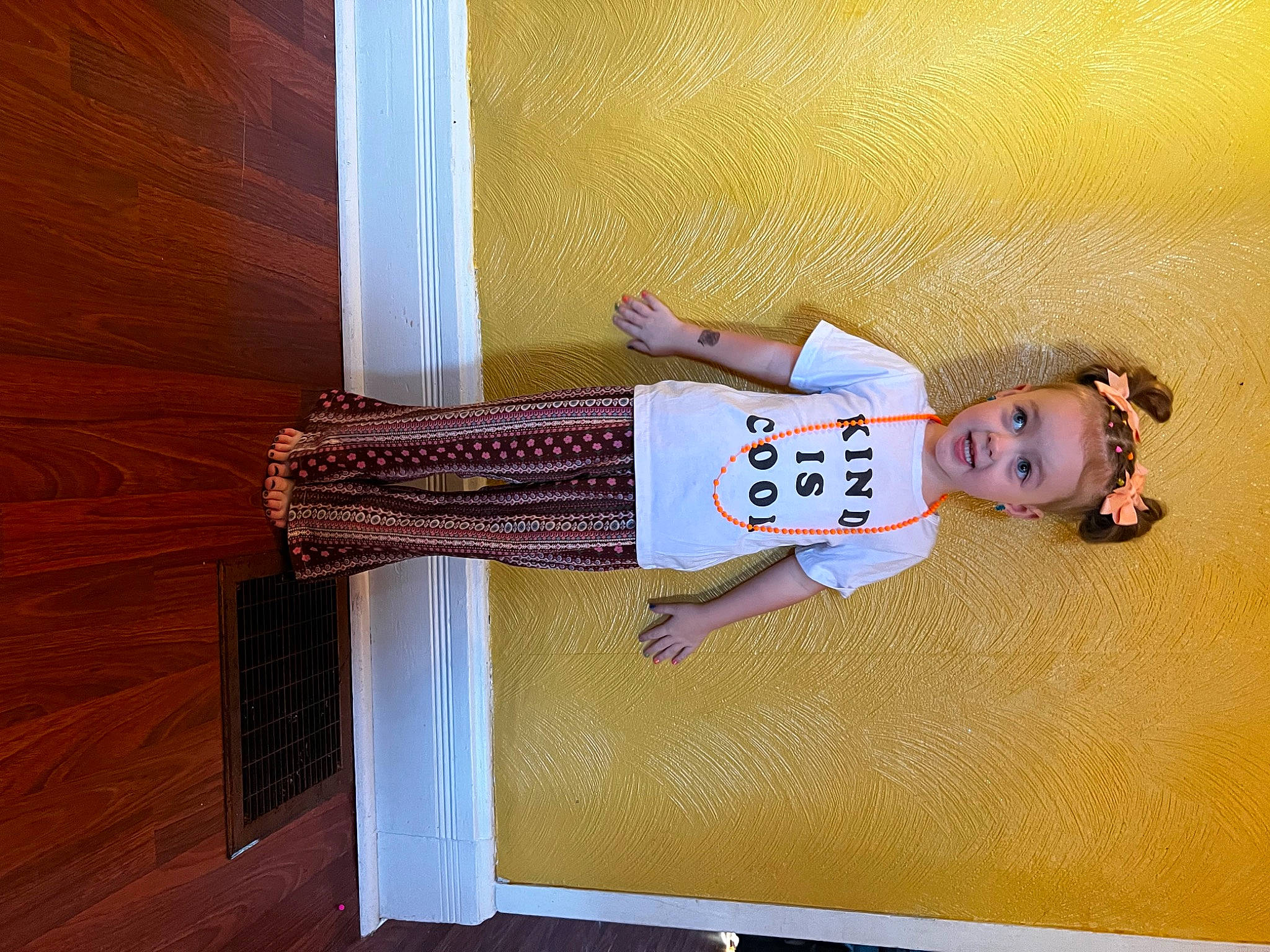 Sherry is registered to the contest to win money with this photo: baby_toddler_clothing, child, floor, flooring, happy, hardwood, laminate_flooring, magenta, pattern, person, plank, plywood, rectangle, room, sleeve, toddler, varnish, wood, wood_flooring, wood_stain